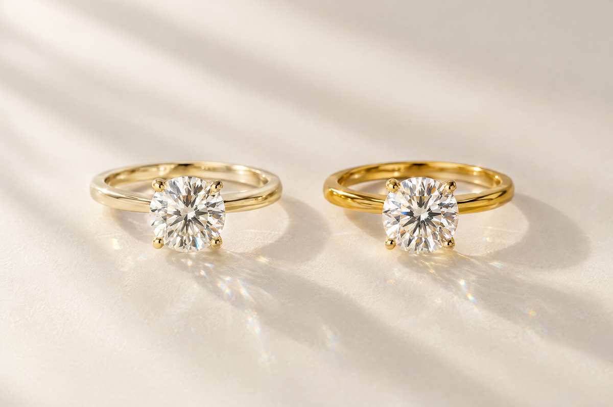Two solitaire engagement rings in 14K and 18K yellow gold