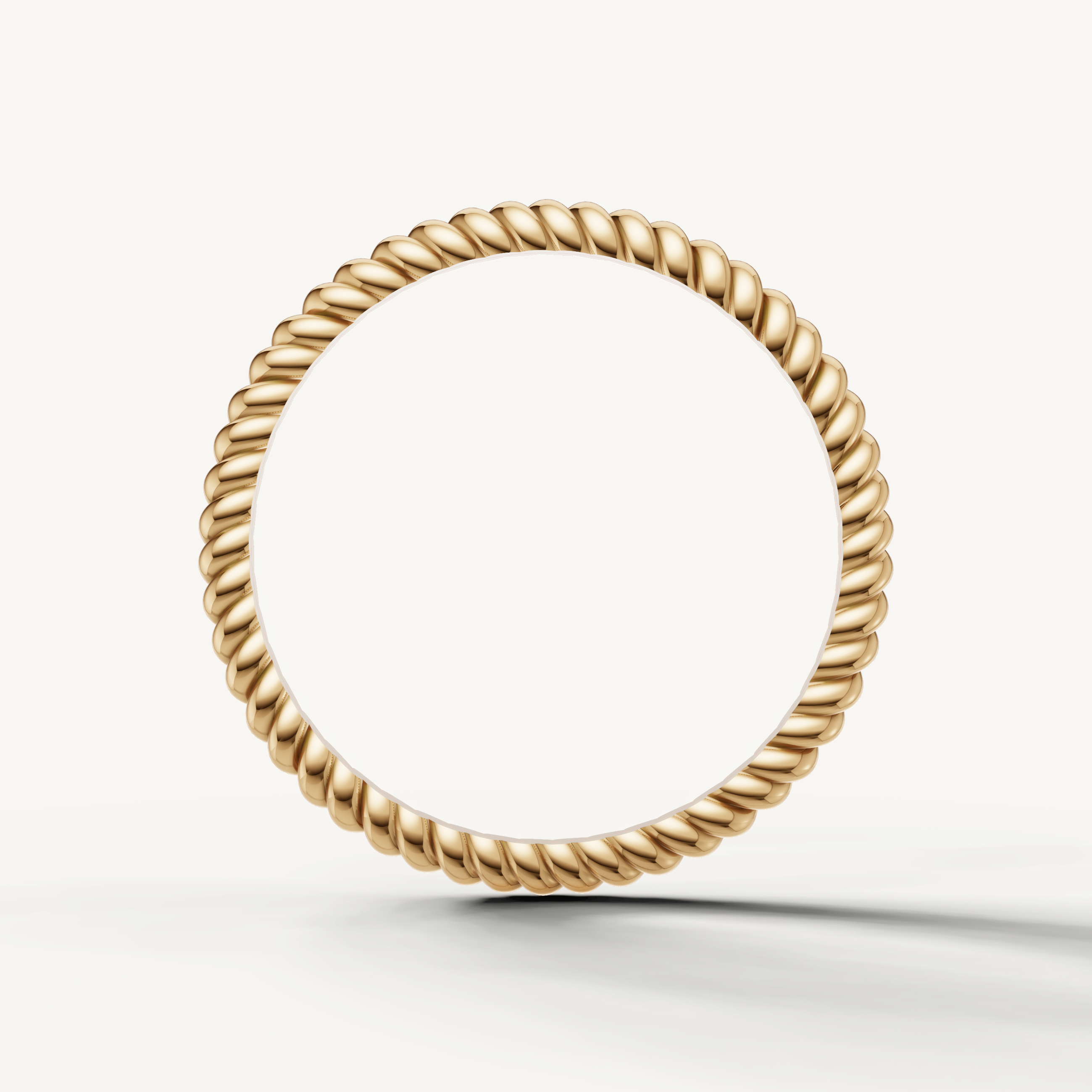 Modern yellow gold twisted wedding ring with classic rope detailing