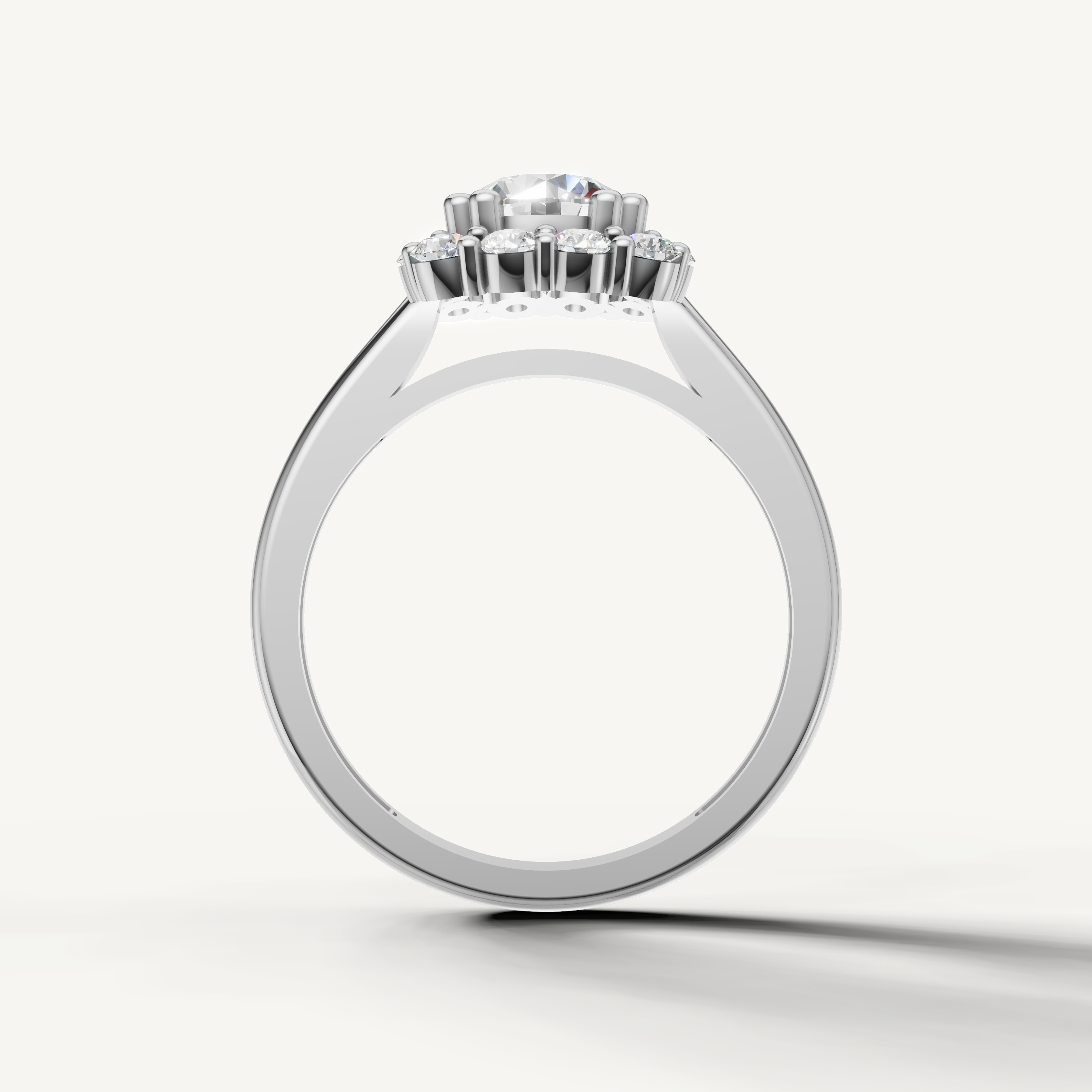 White gold round diamond engagement ring with elegant floral halo by Raul Diamonds.