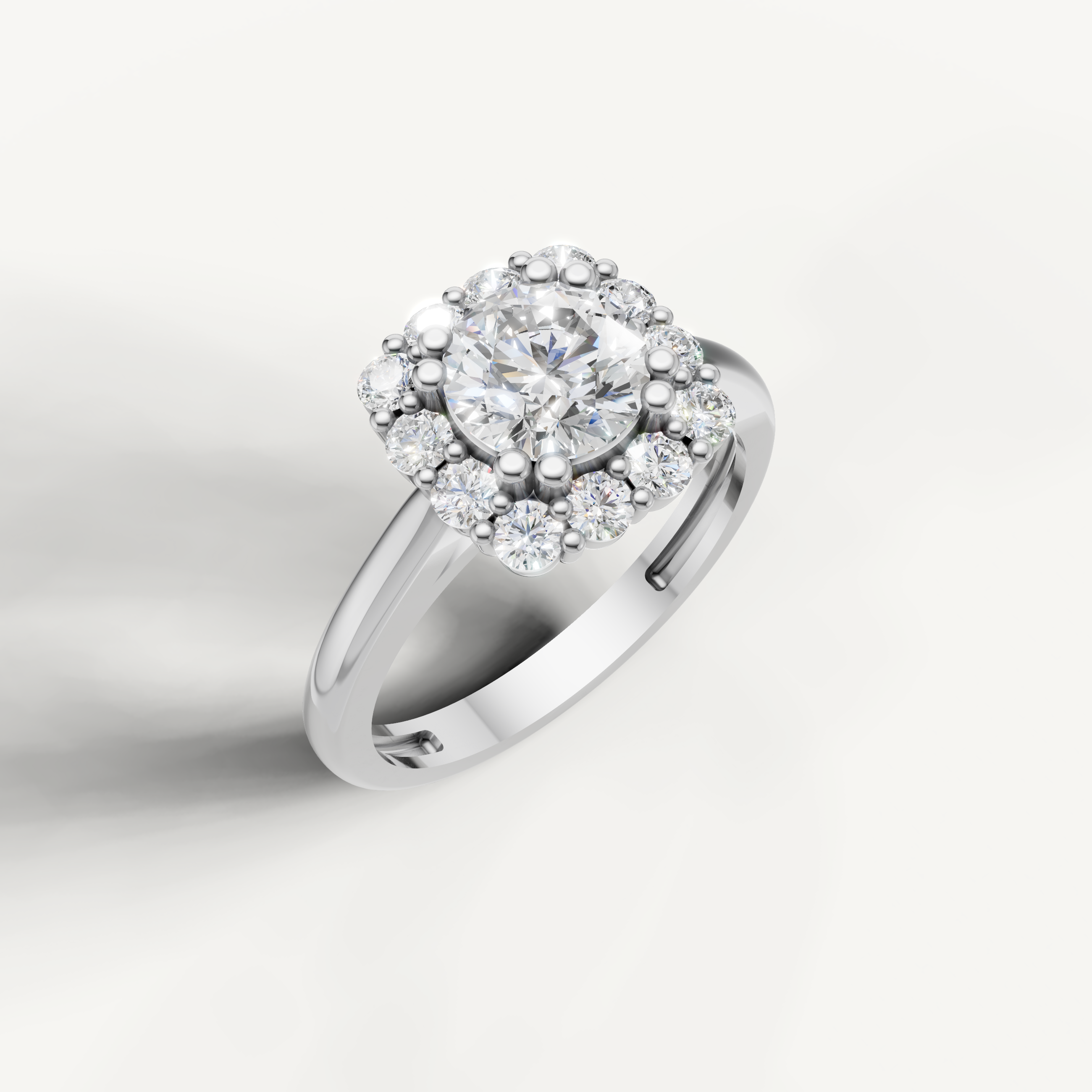 White gold round brilliant diamond ring with vintage halo setting by Raul Diamonds.