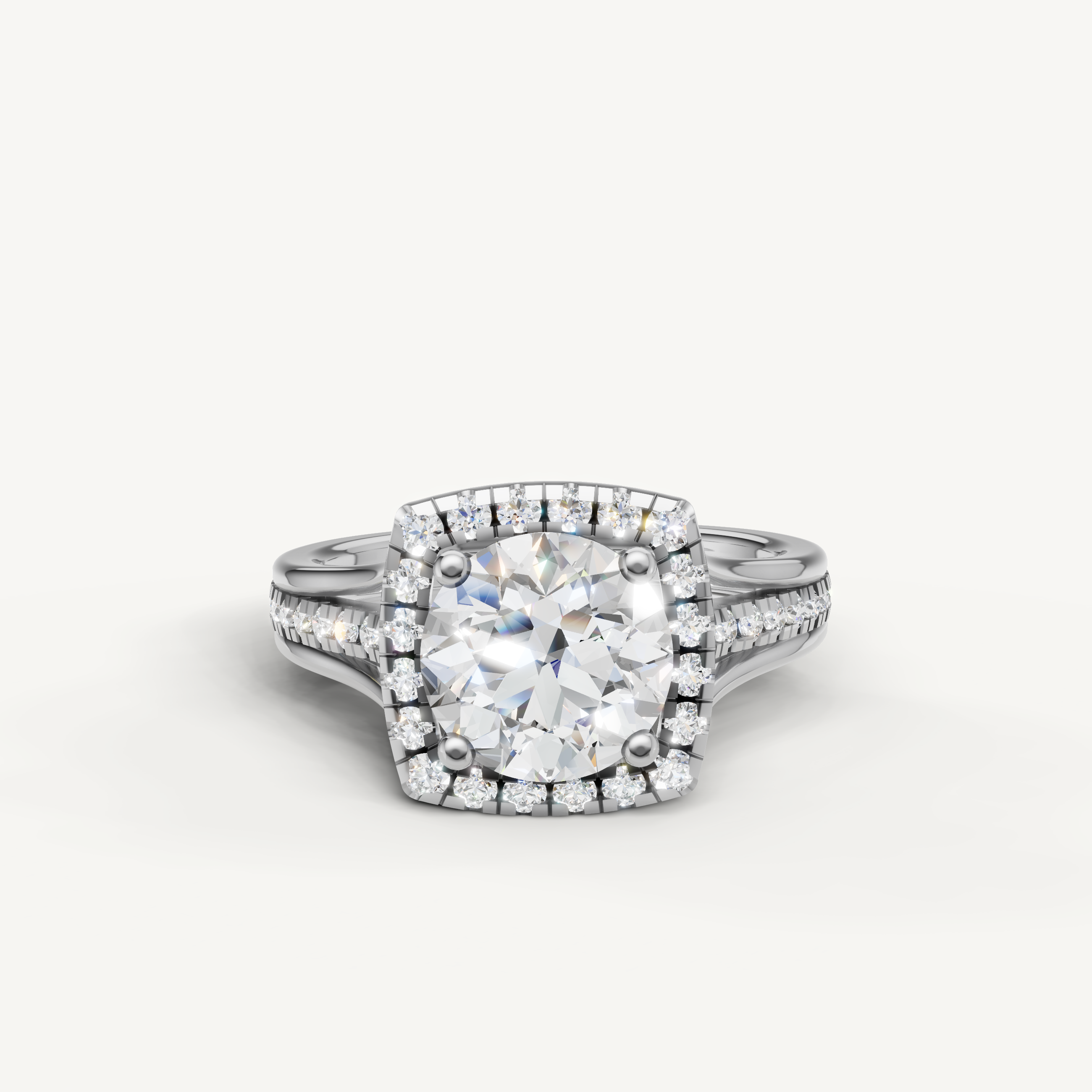 Raul Diamonds round halo engagement ring in white gold with pavé diamonds.