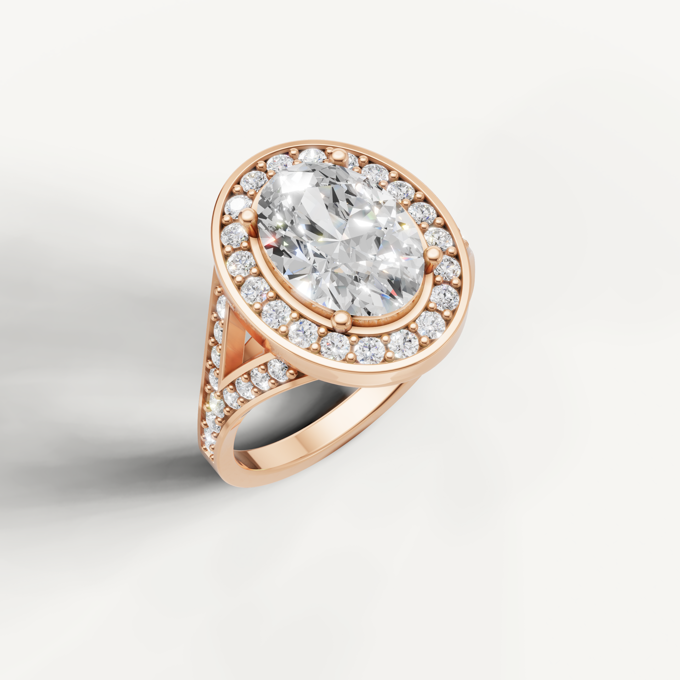 Rose gold oval cut diamond ring with elegant vintage inspired halo by Raul Diamonds.