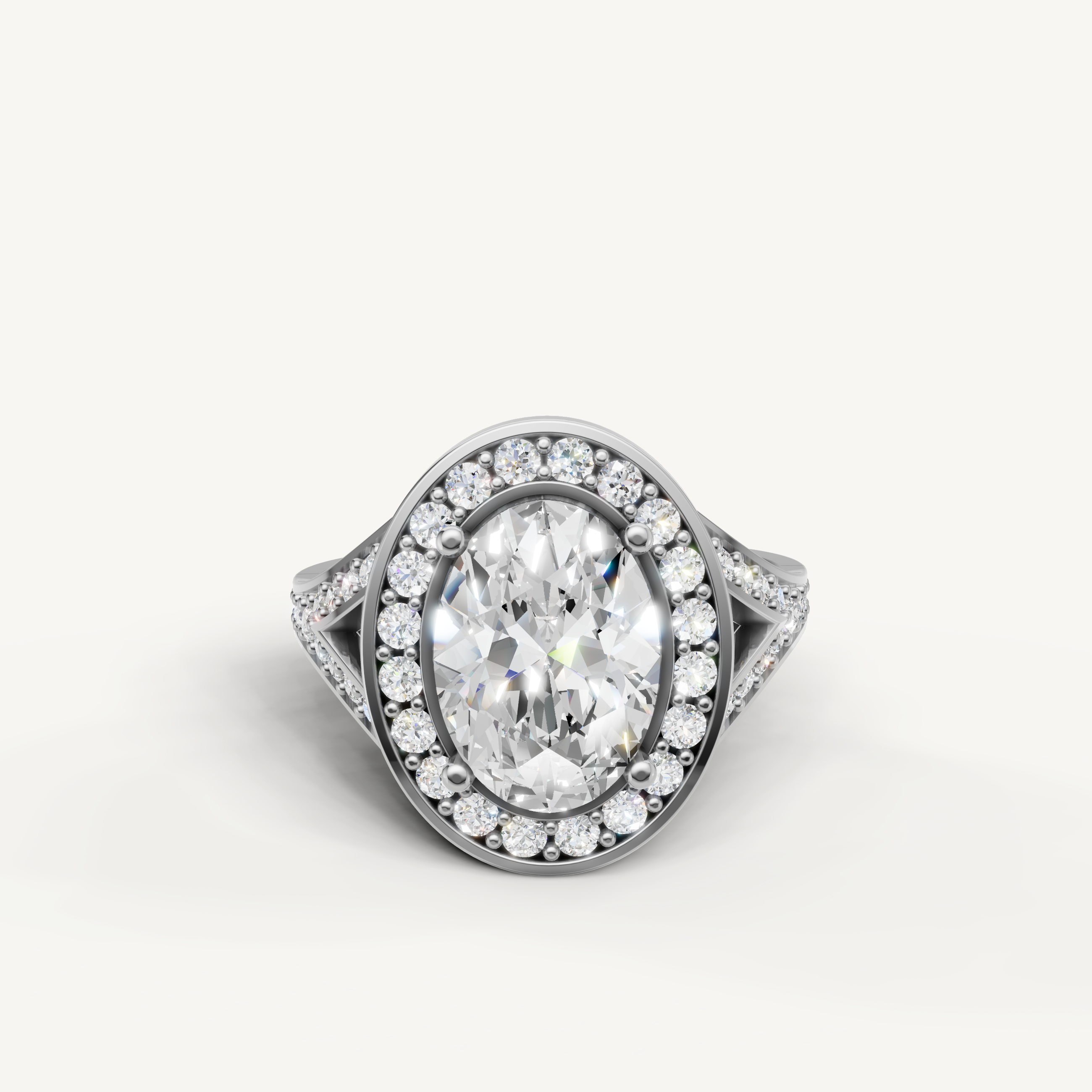 Raul Diamonds oval halo engagement ring in white gold with sparkling diamonds.