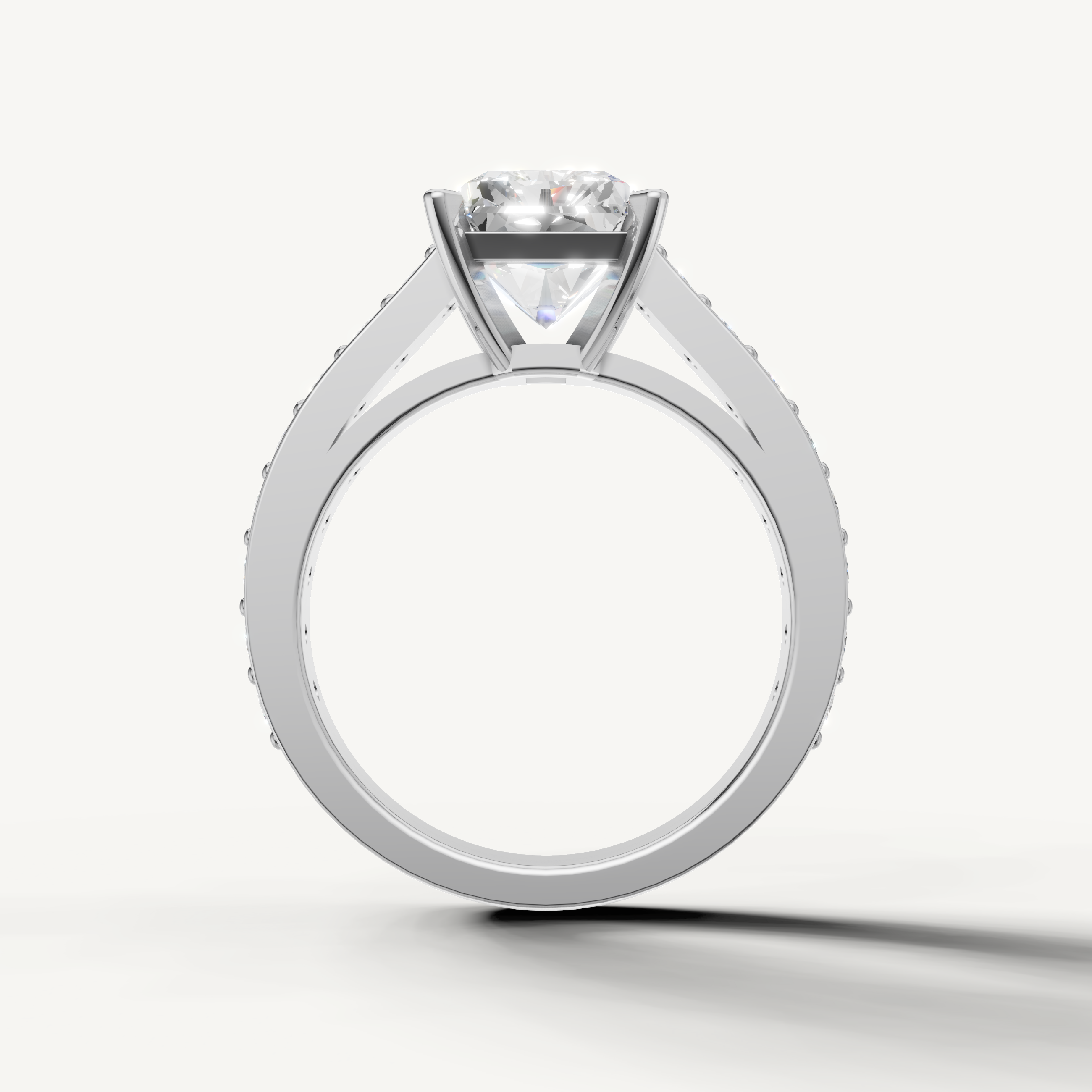 Radiant cut diamond engagement ring in yellow gold by Raul Diamonds