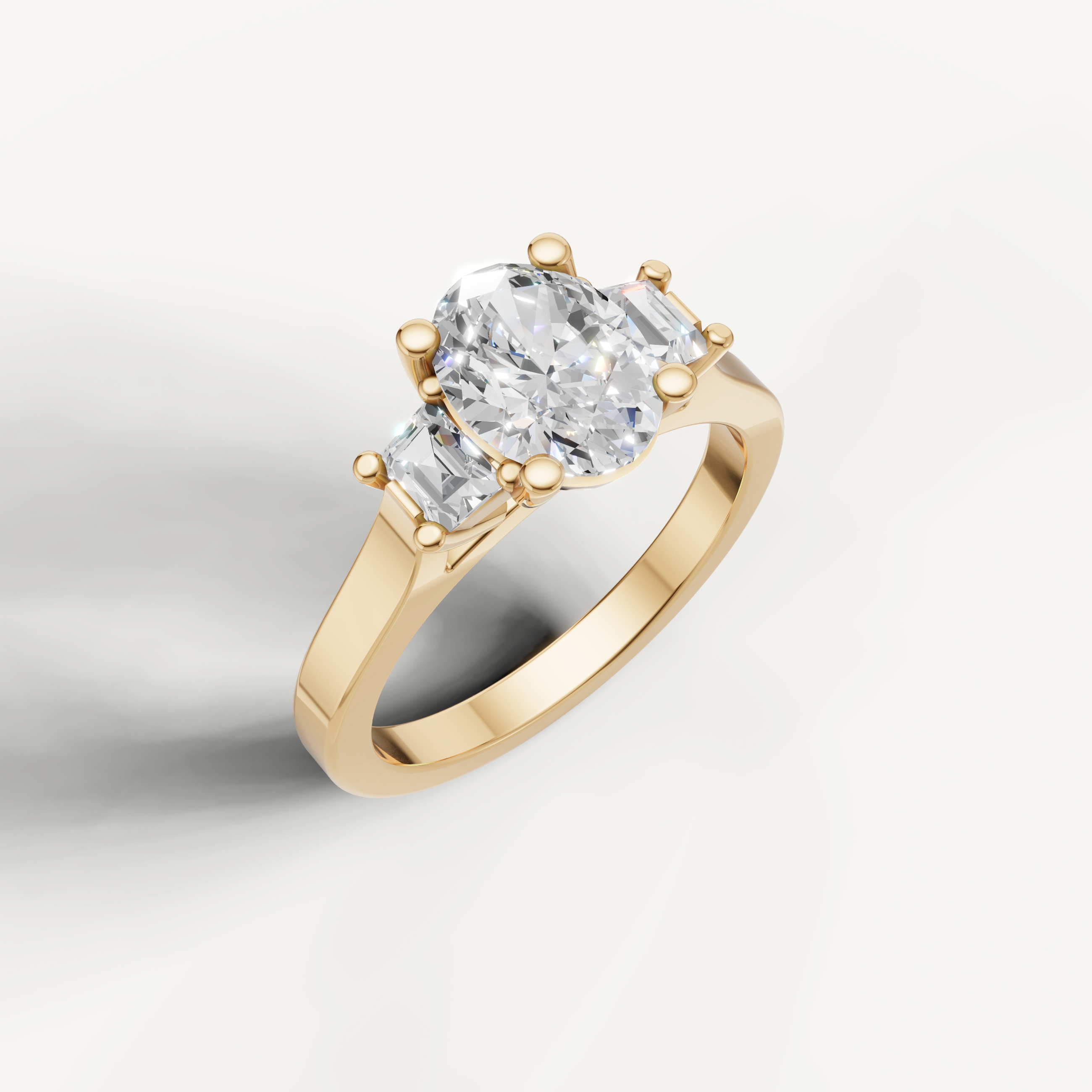 Yellow Gold Oval Cut Diamond Ring with Side Stones by Raul Diamonds