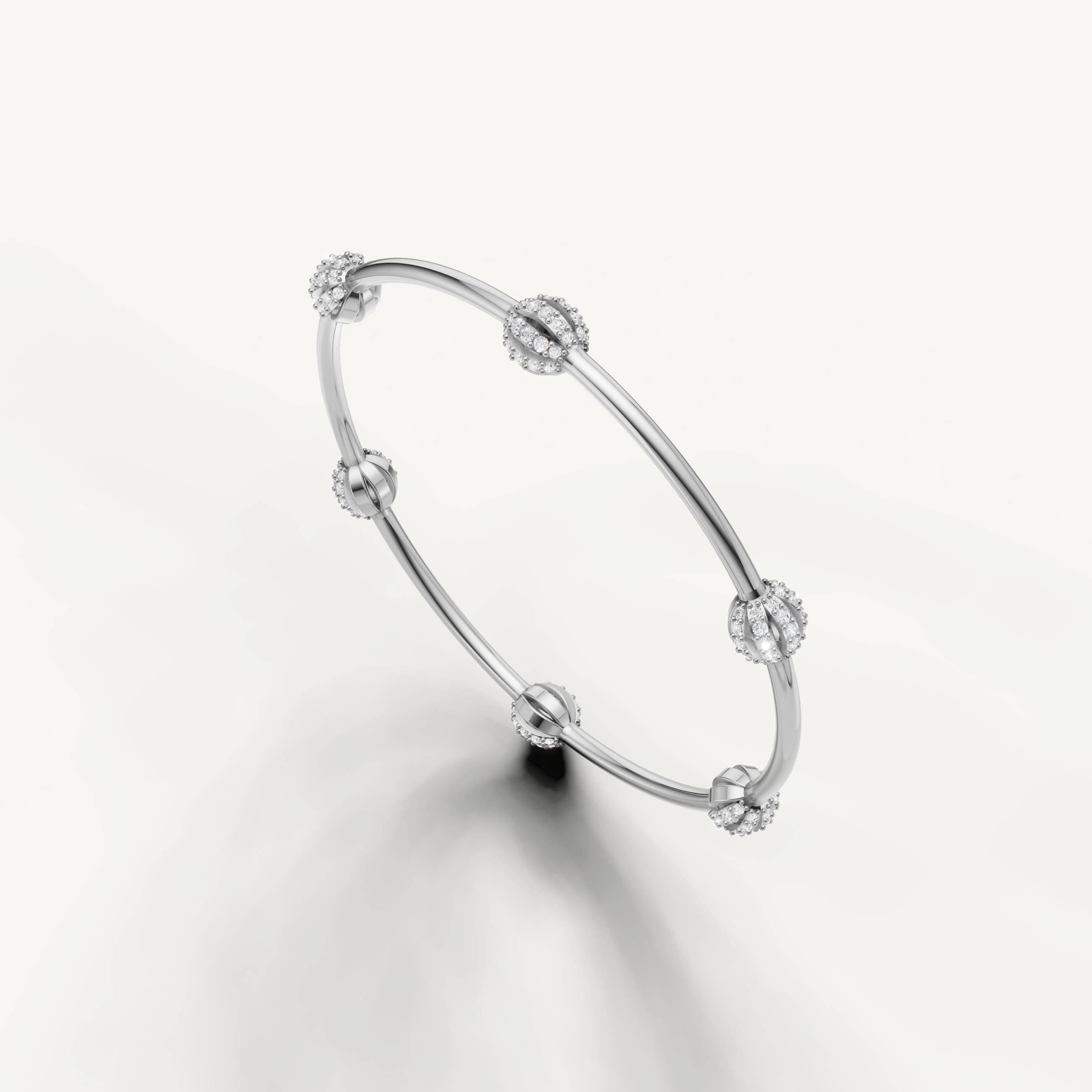 Fine white gold diamond bangle for women by Raul Diamonds with modern styling