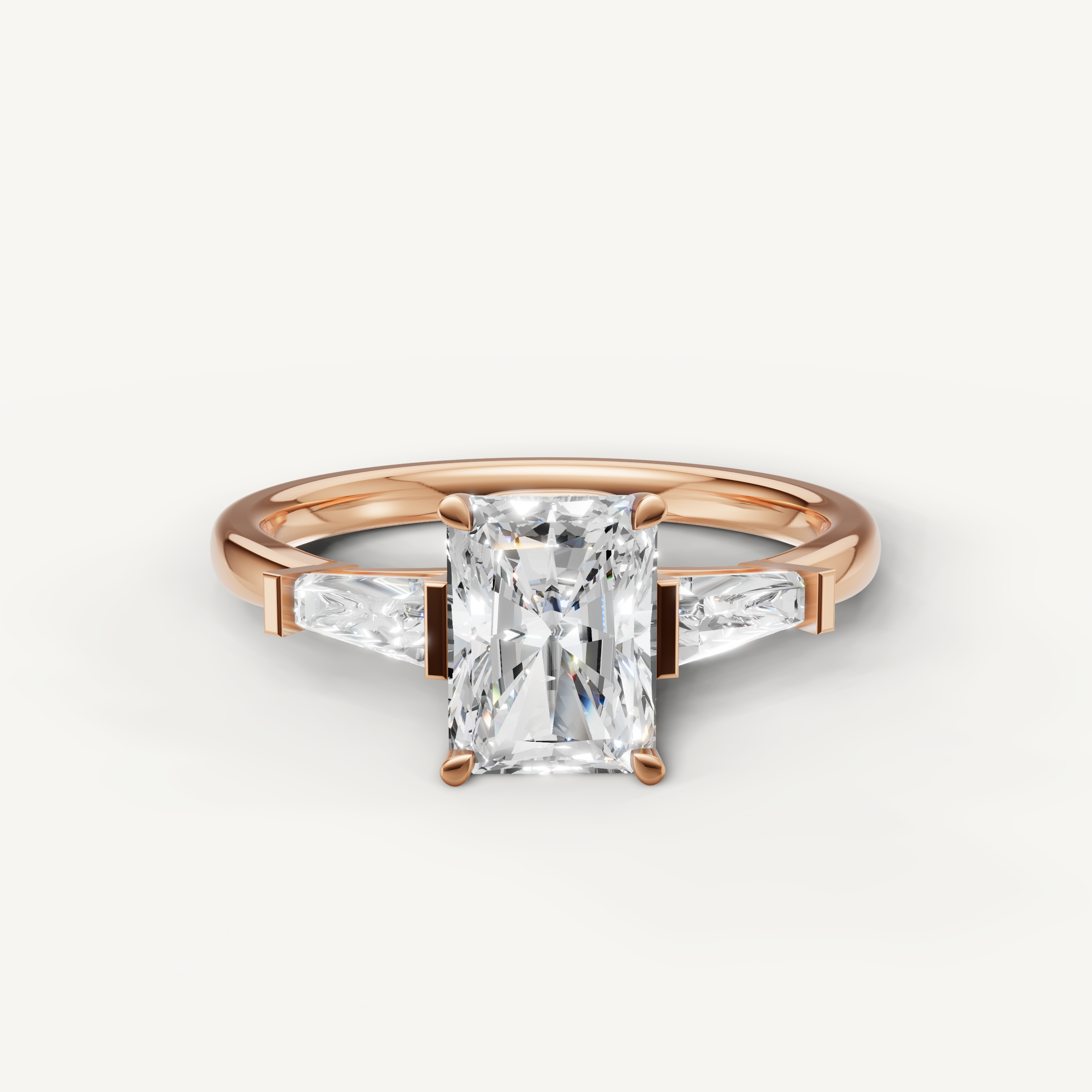 Radiant cut lab grown diamond ring with tapered baguette side stones rose gold engagement ring