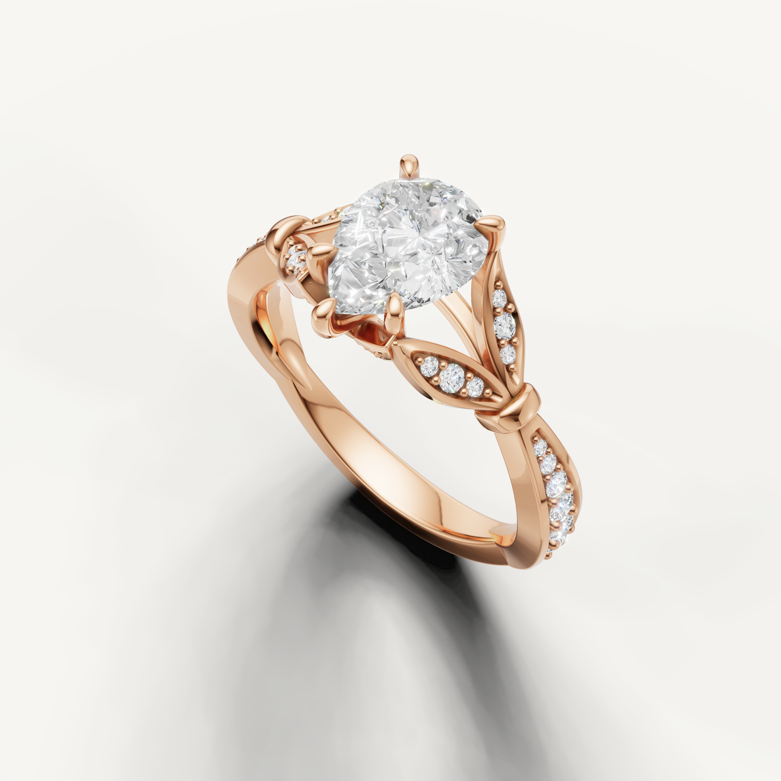 14K rose gold pear engagement ring featuring a sparkling lab grown center diamond by Raul Diamonds