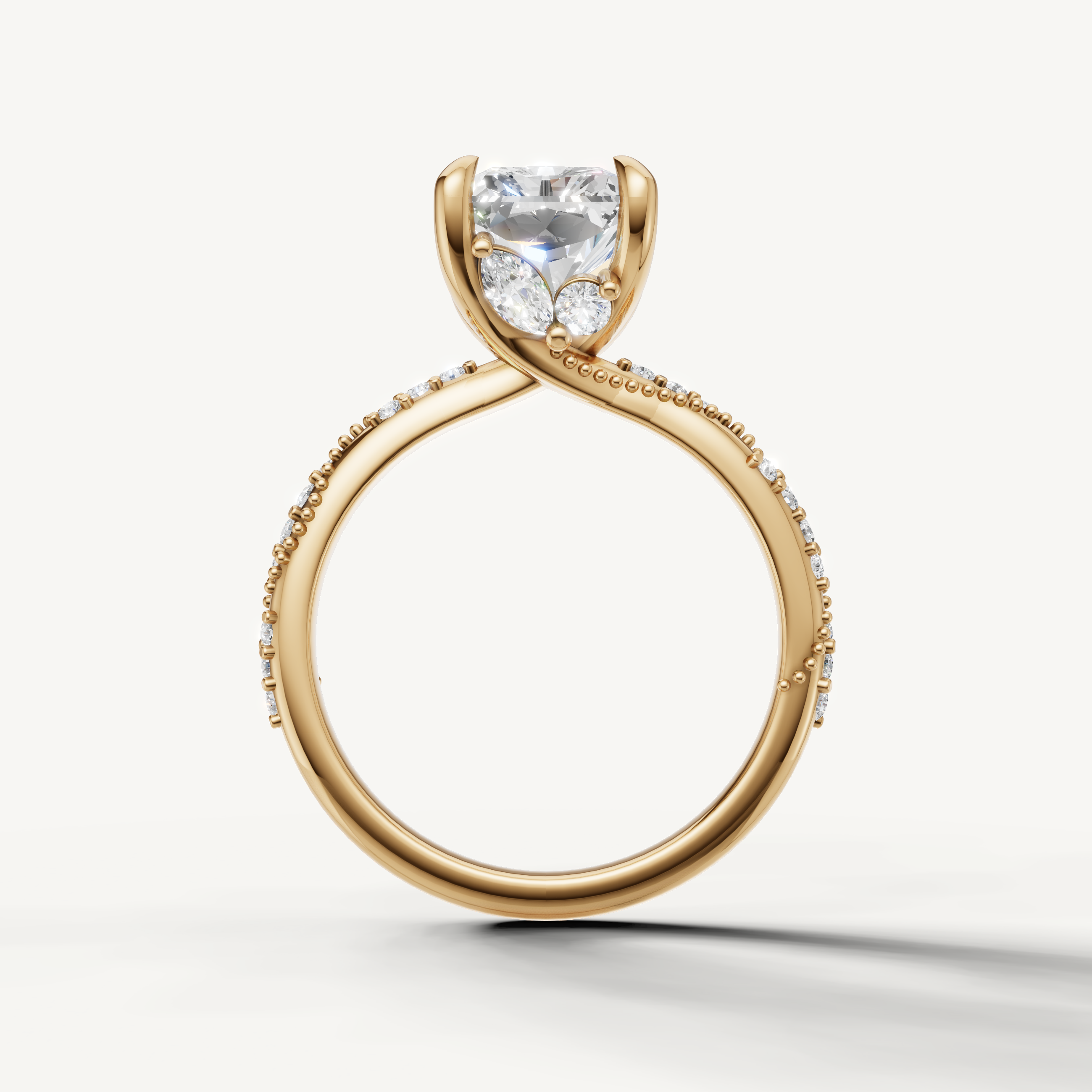 radiant diamond engagement ring with elegant crossover pavé band yellow gold