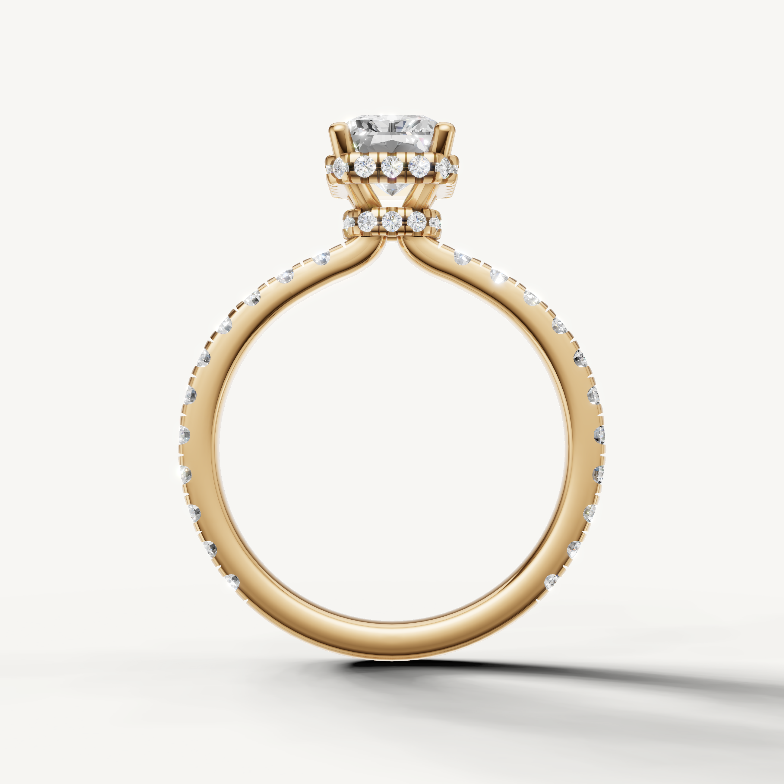 modern radiant cut lab grown diamond hidden halo ring in 14k yellow gold with dazzling pavé diamond band