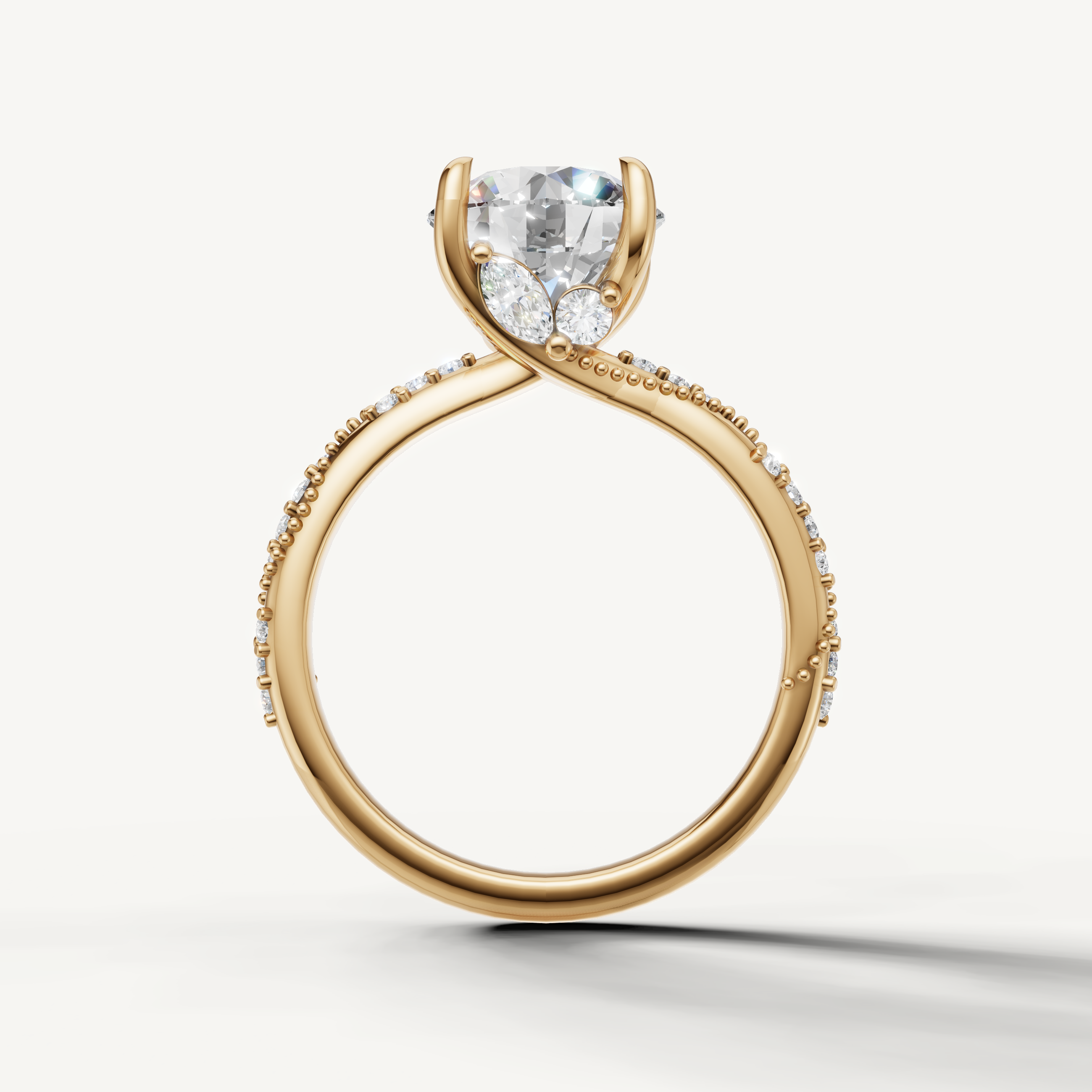 round diamond engagement ring with elegant crossover pavé band yellow gold
