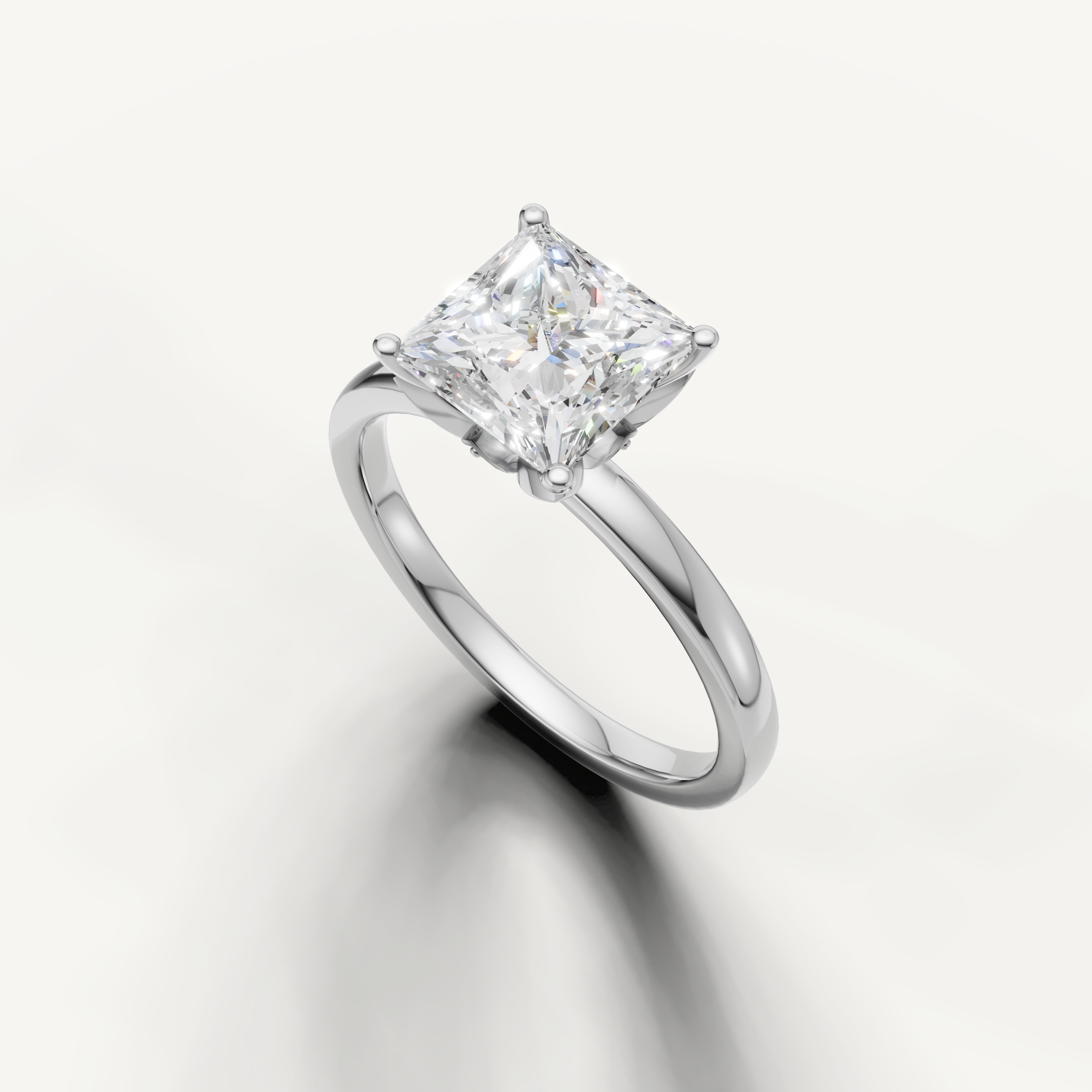 Elegant princess cut solitaire ring with classic 4 prong setting white gold
