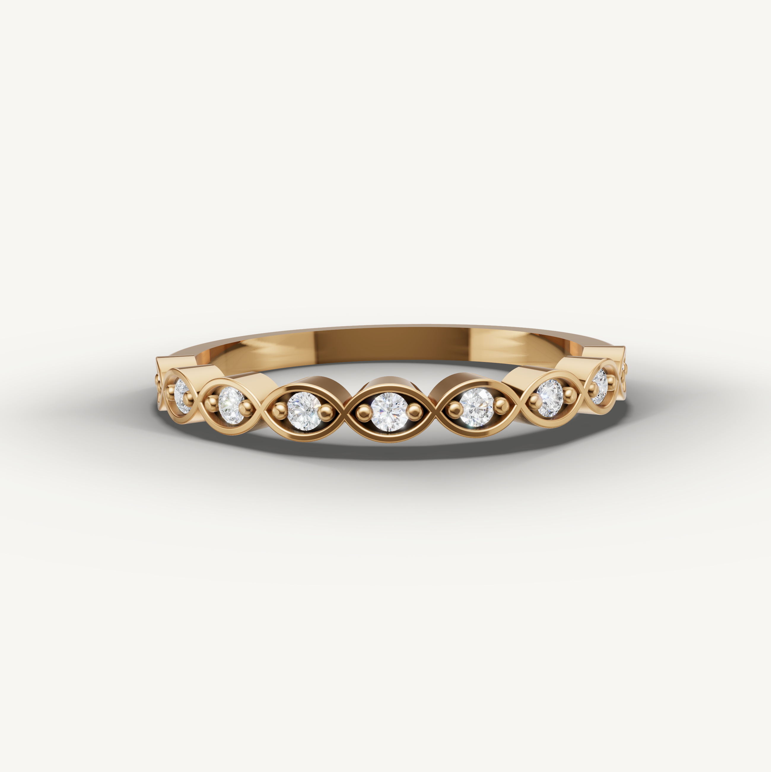 Elegant yellow gold diamond eternity wedding band by Raul Diamonds with bezel style round diamonds