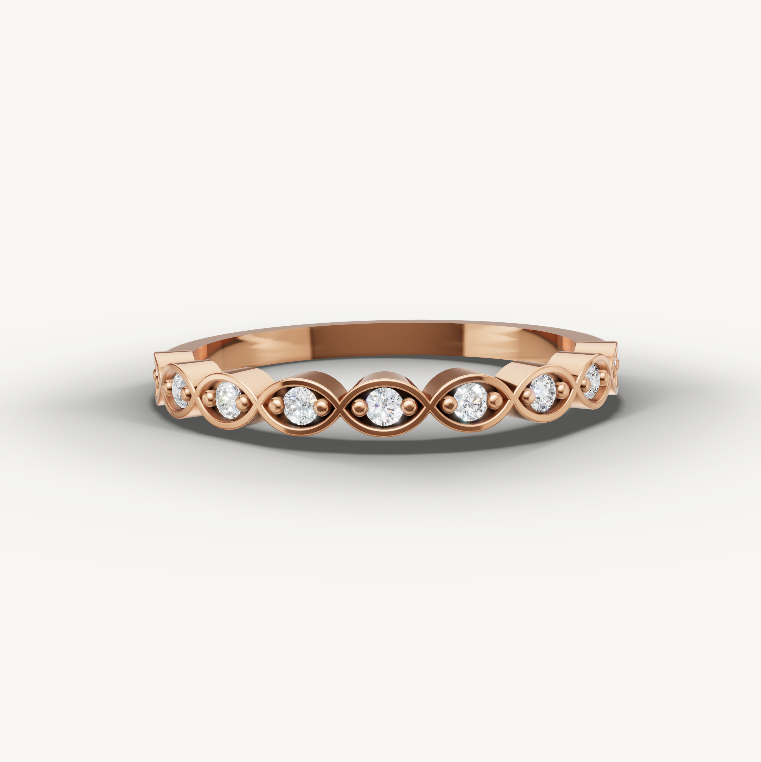 Romantic rose gold diamond eternity wedding band with vintage infinity detailing by Raul Diamonds