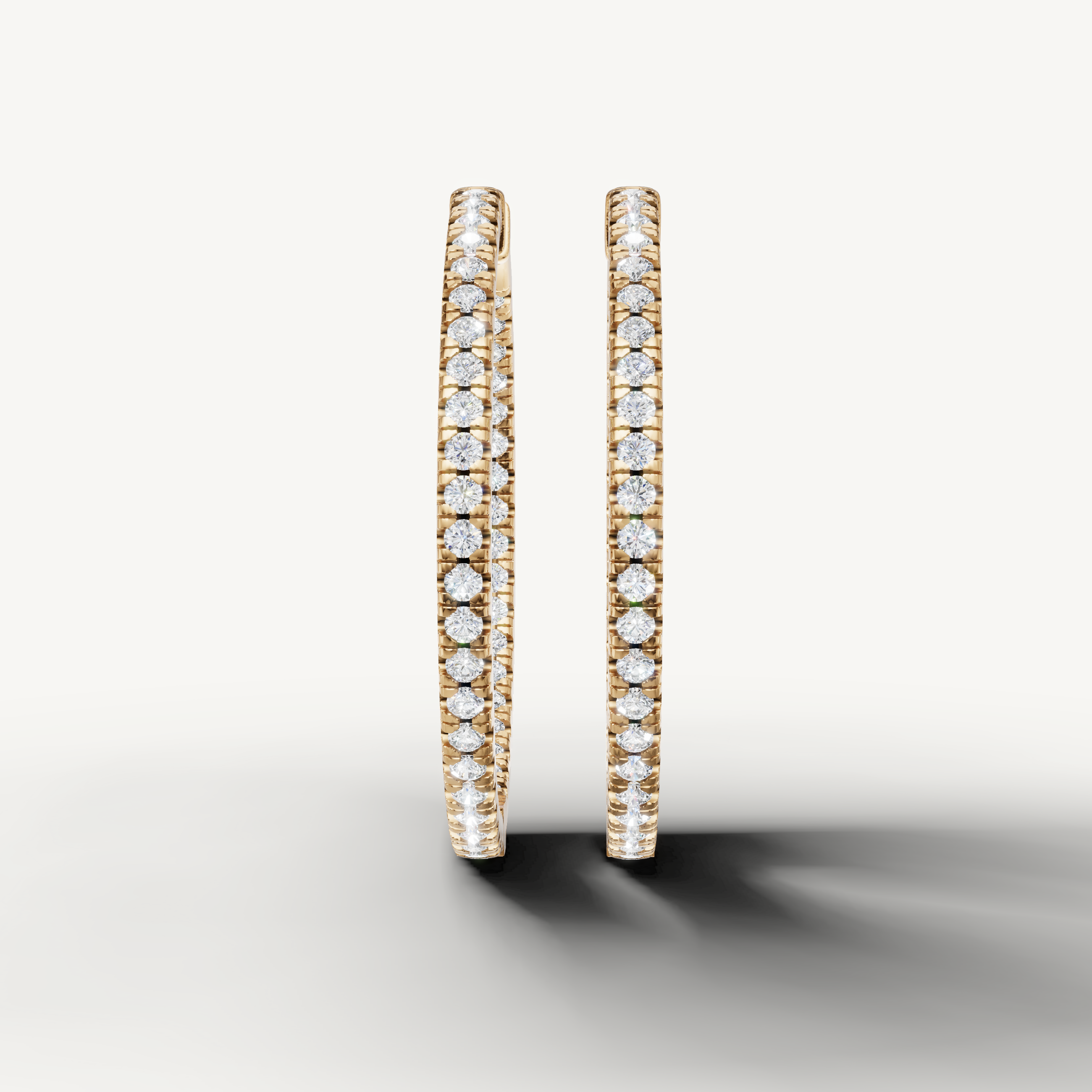 Raul Diamonds yellow gold diamond hoop earrings with pave round brilliant diamonds