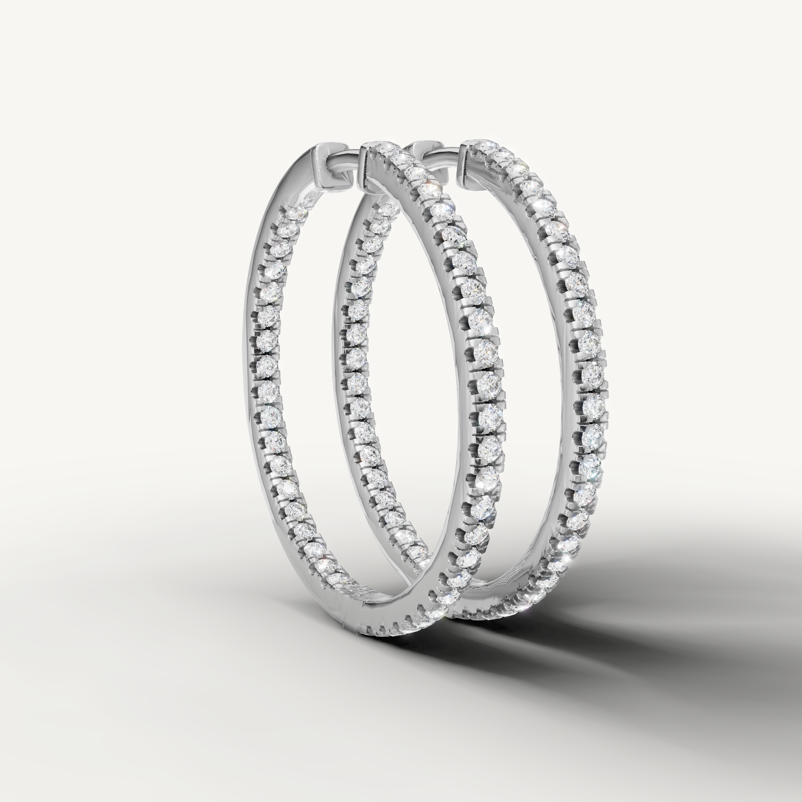 Luxury white gold pave diamond hoop earrings for women with elegant sparkle by Raul Diamonds