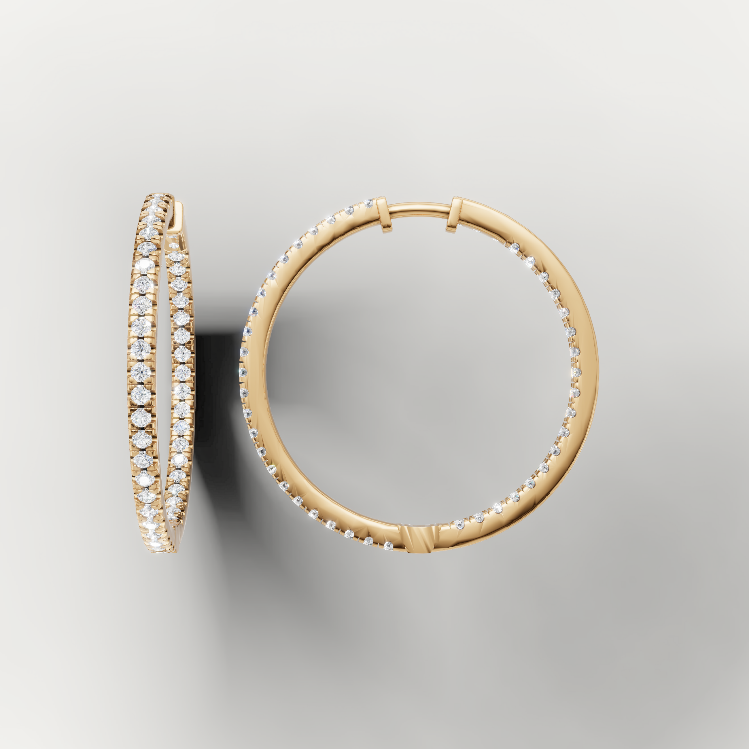 Yellow gold slim diamond hoop earrings by Raul Diamonds featuring elegant luxury sparkle