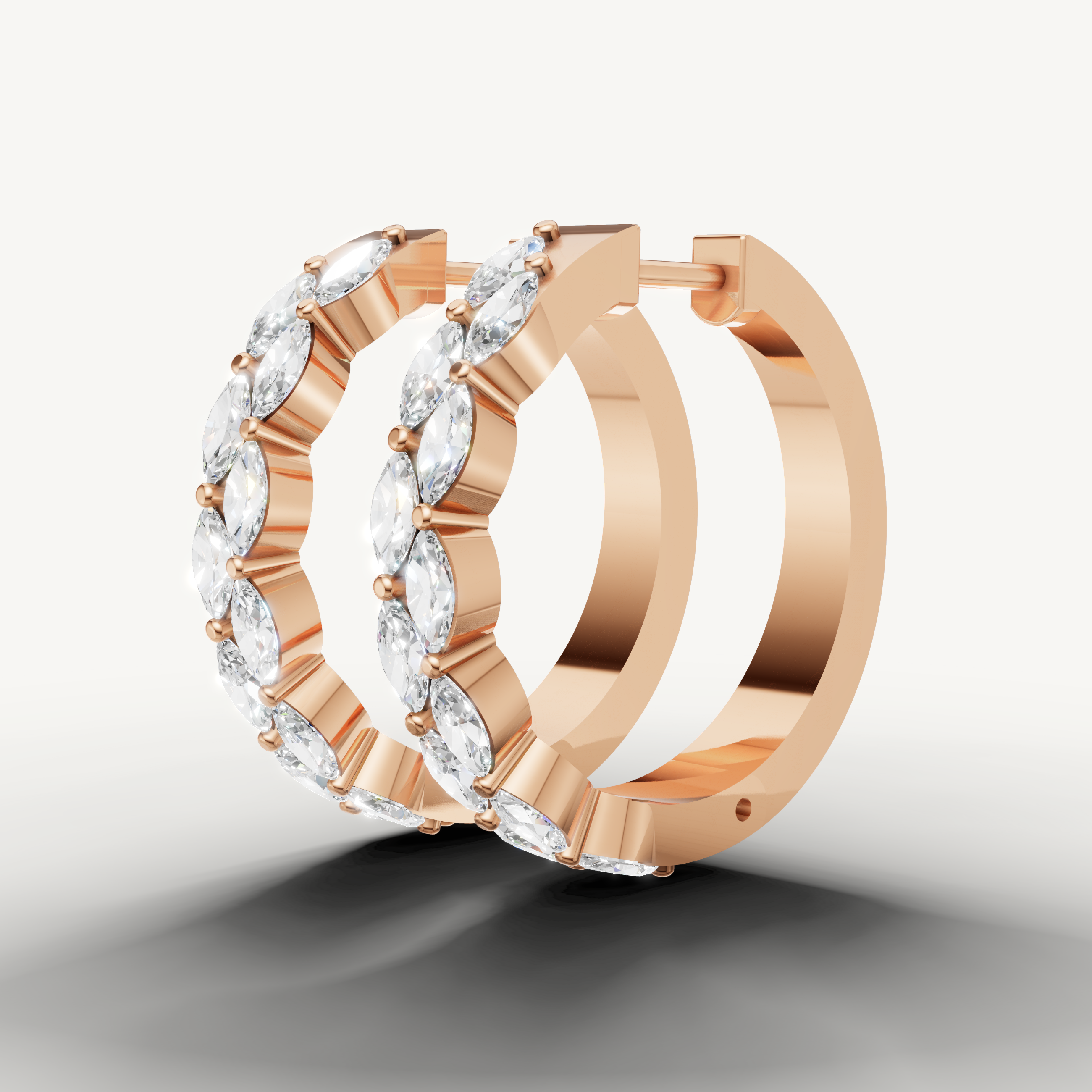 Raul Diamonds rose gold marquise diamond hoops with modern fine jewelry styling