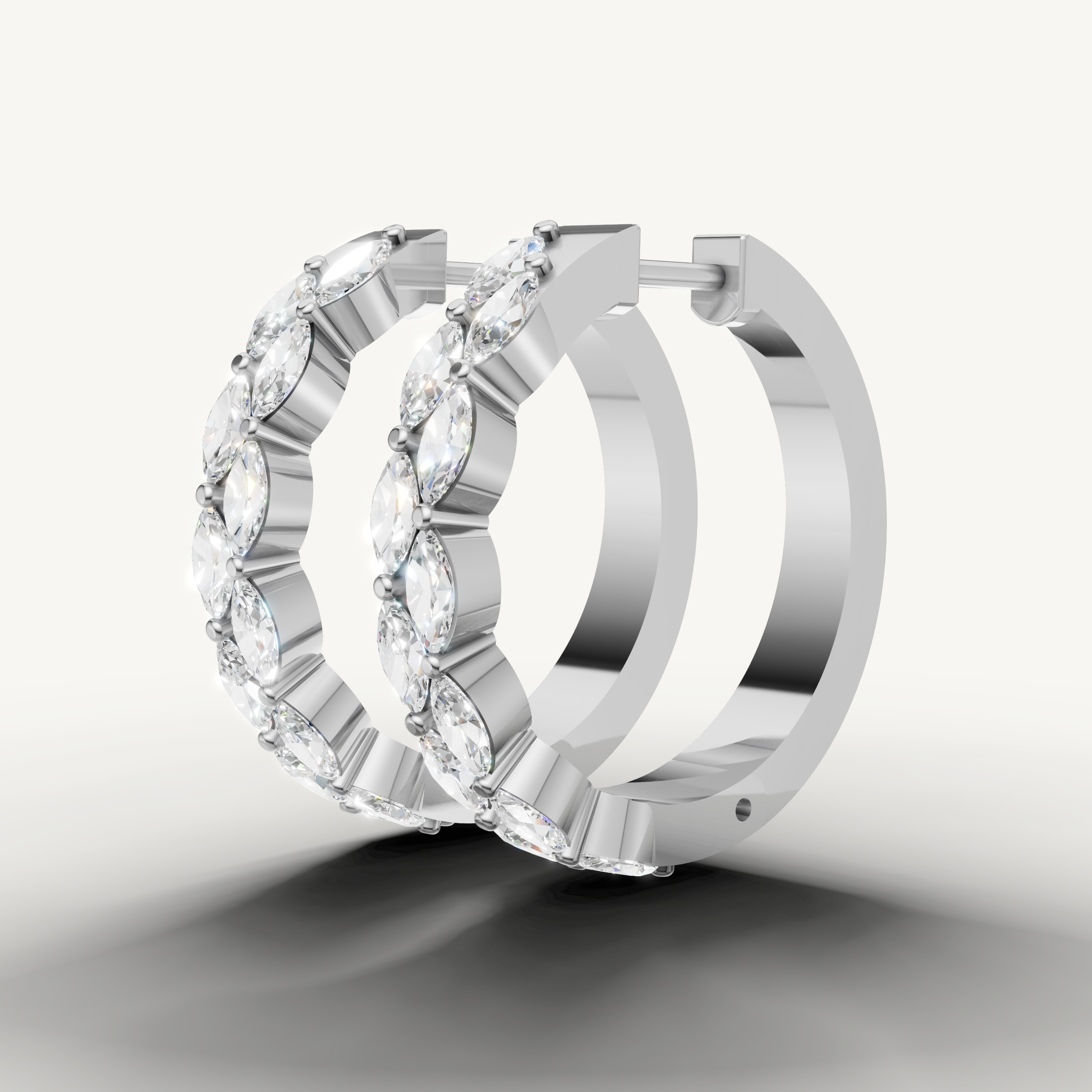 Raul Diamonds white gold marquise diamond hoops with fine jewelry craftsmanship and brilliance