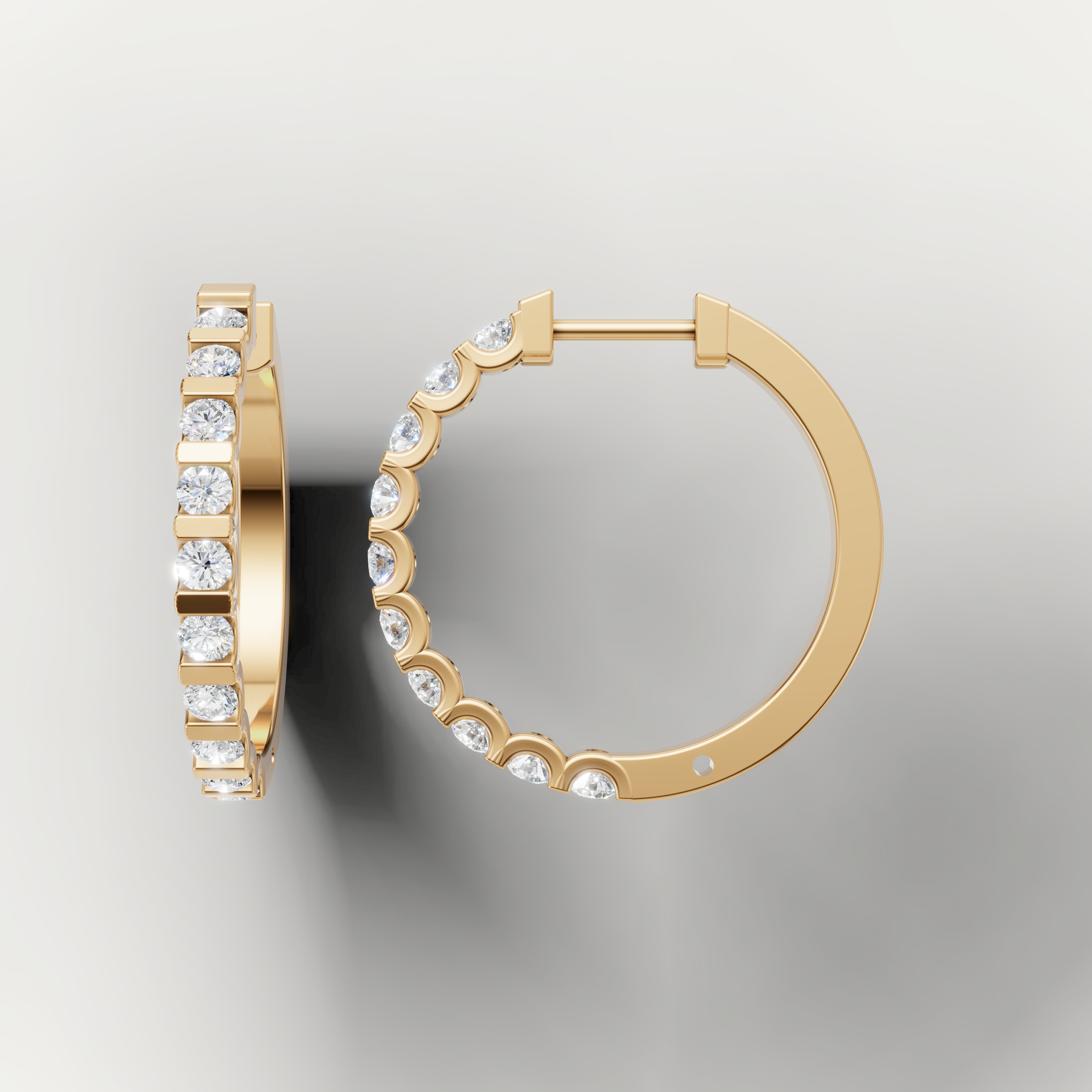 Yellow gold round diamond hoop earrings by Raul Diamonds featuring sleek contemporary styling