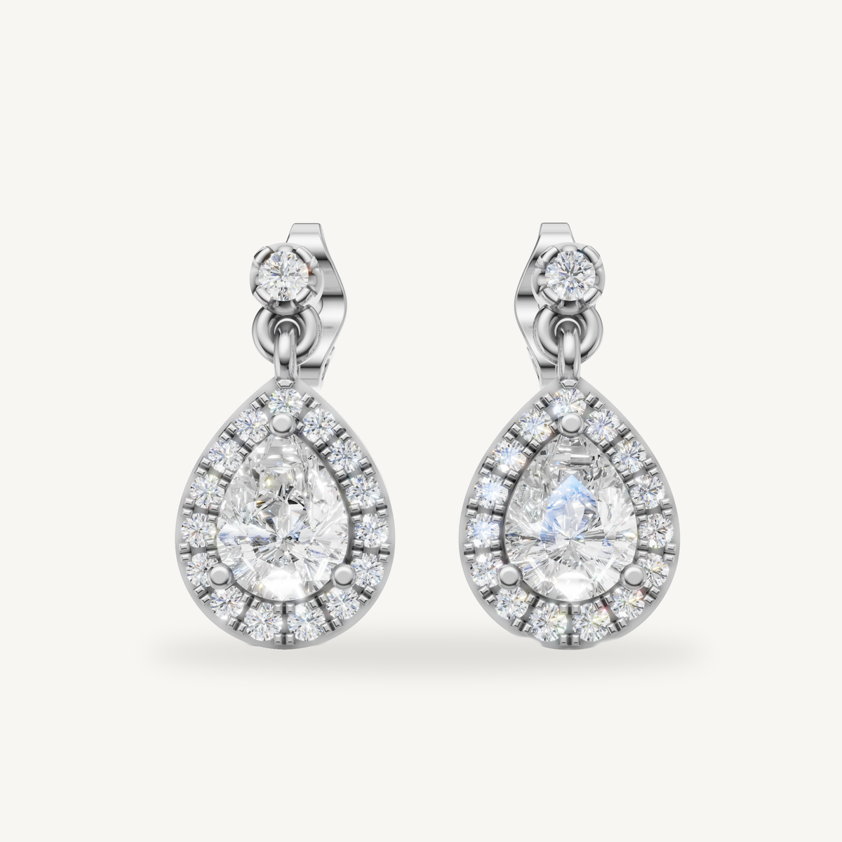 Raul Diamonds white gold pear shape halo diamond drop earrings with radiant brilliance