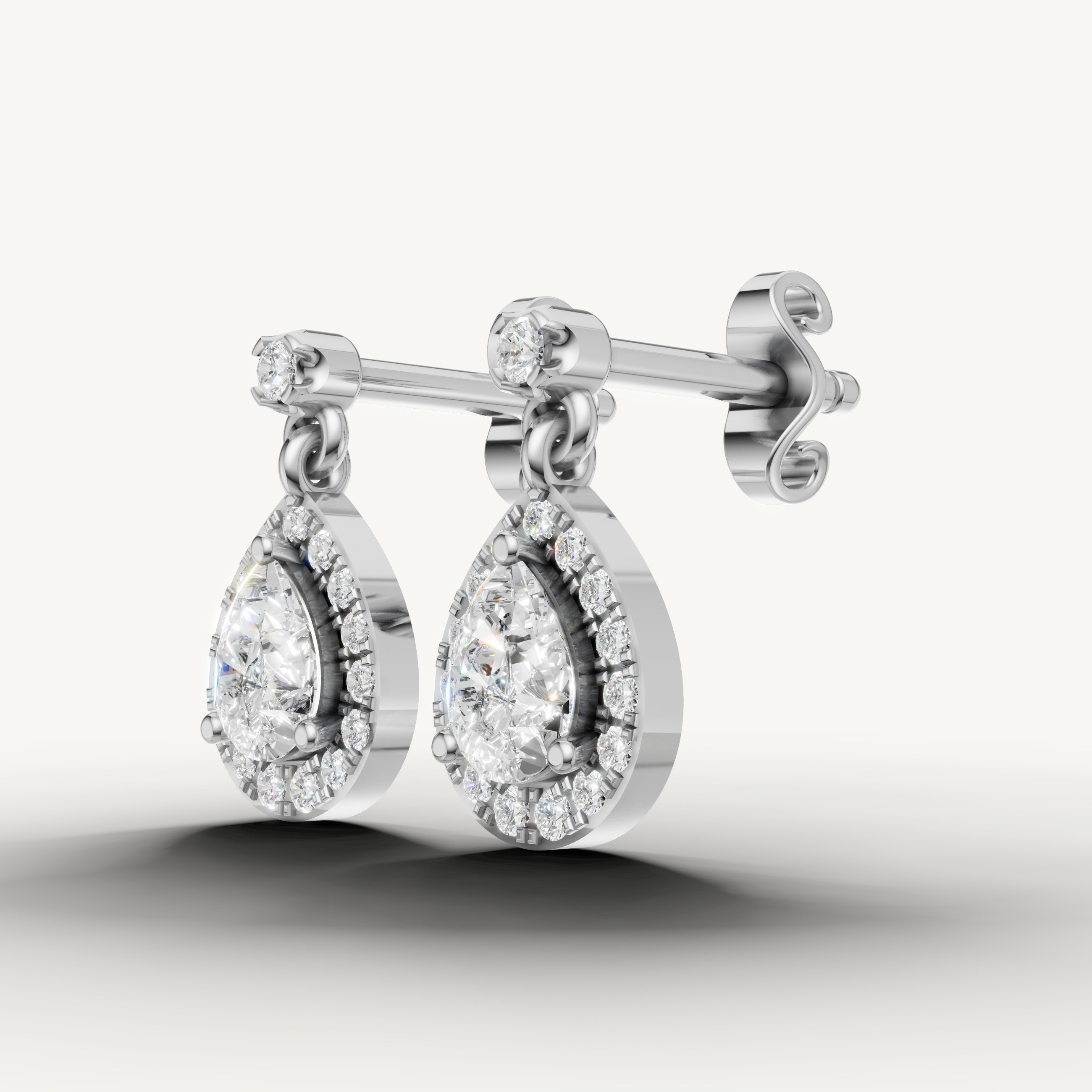Raul Diamonds white gold pear halo diamond drop earrings for luxury jewelry lovers