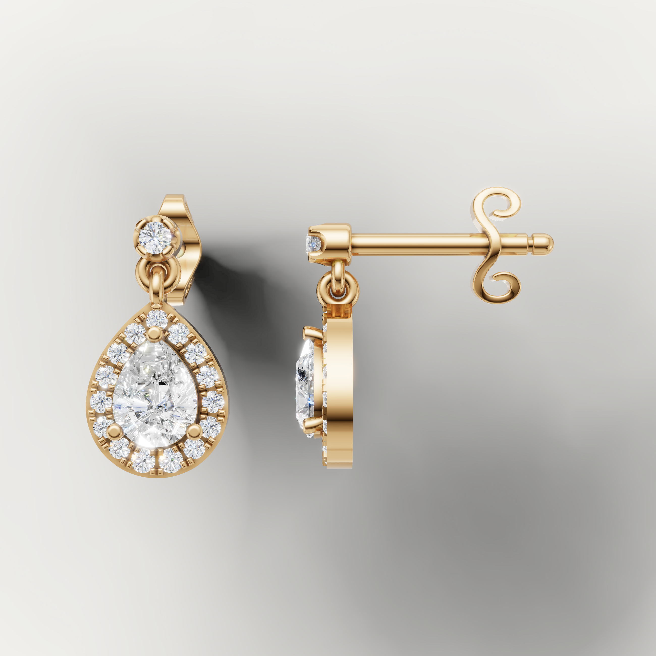 Yellow gold pear cut diamond dangle earrings by Raul Diamonds with brilliant halo sparkle