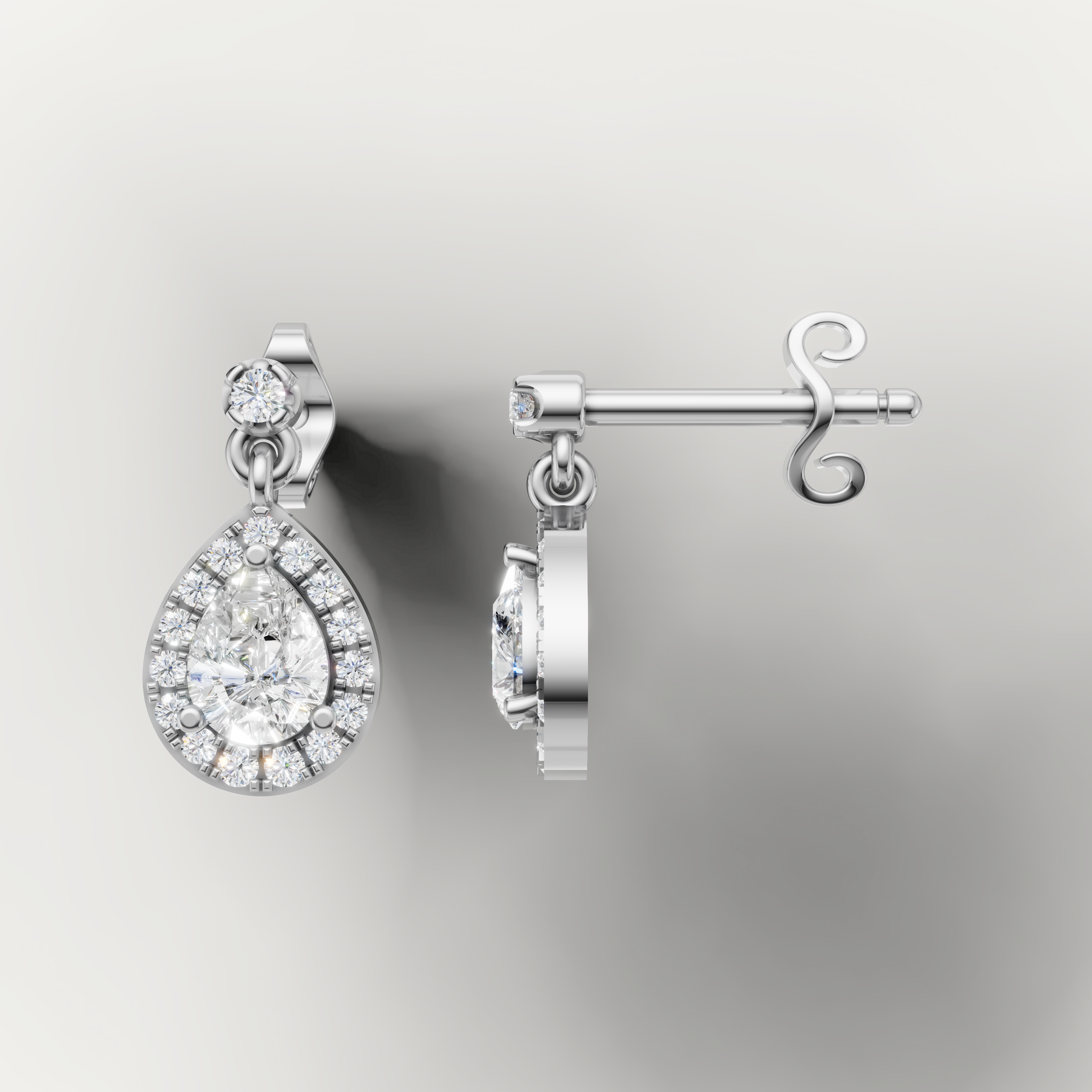 White gold pear cut diamond dangle earrings by Raul Diamonds with timeless sparkle