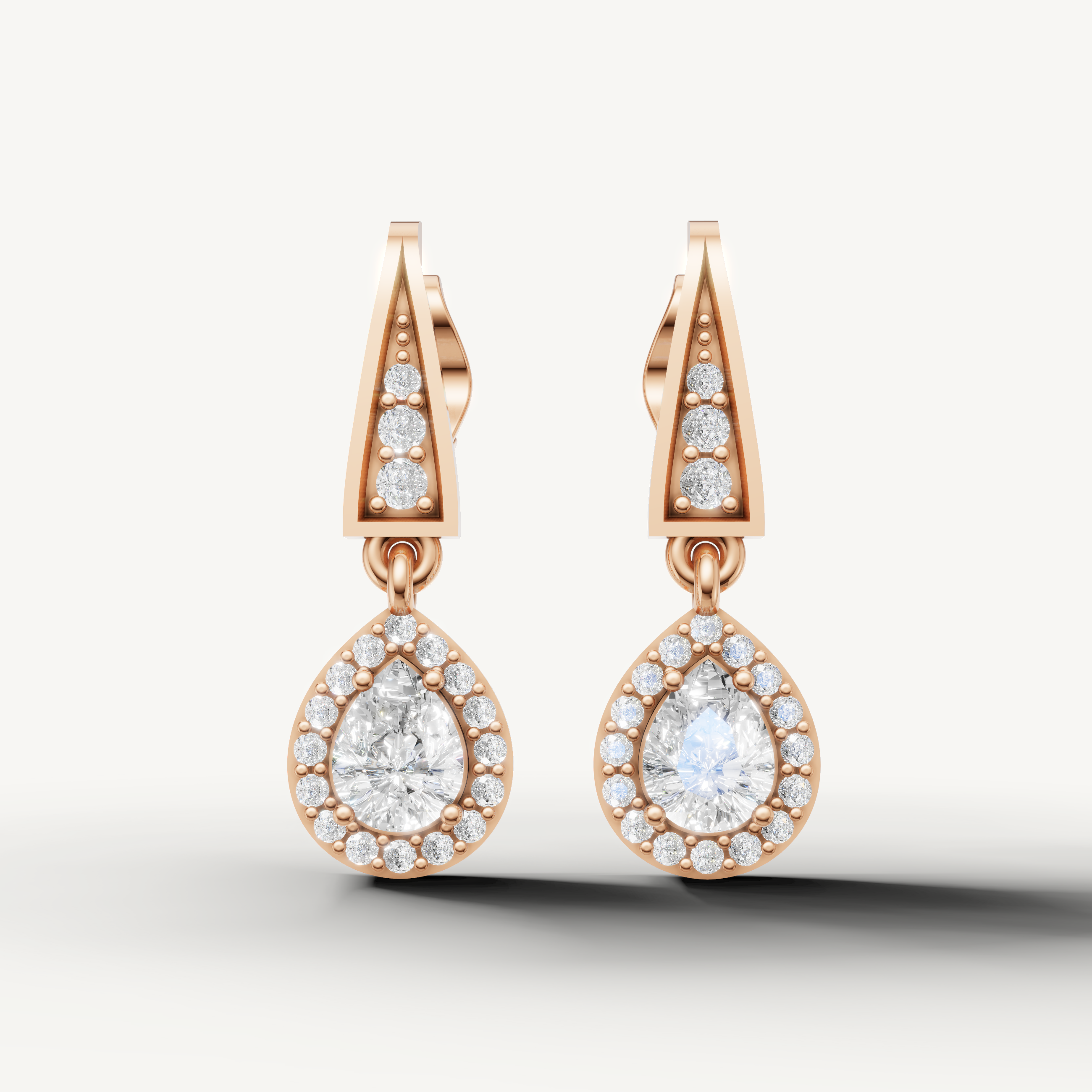 Raul Diamonds rose gold pear shape diamond drop earrings with timeless elegance