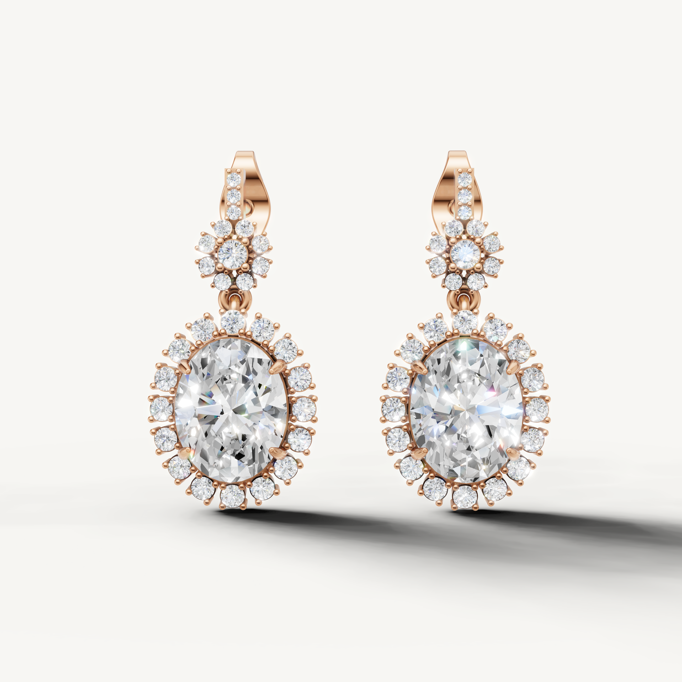 Raul Diamonds rose gold oval diamond halo drop earrings with timeless elegance