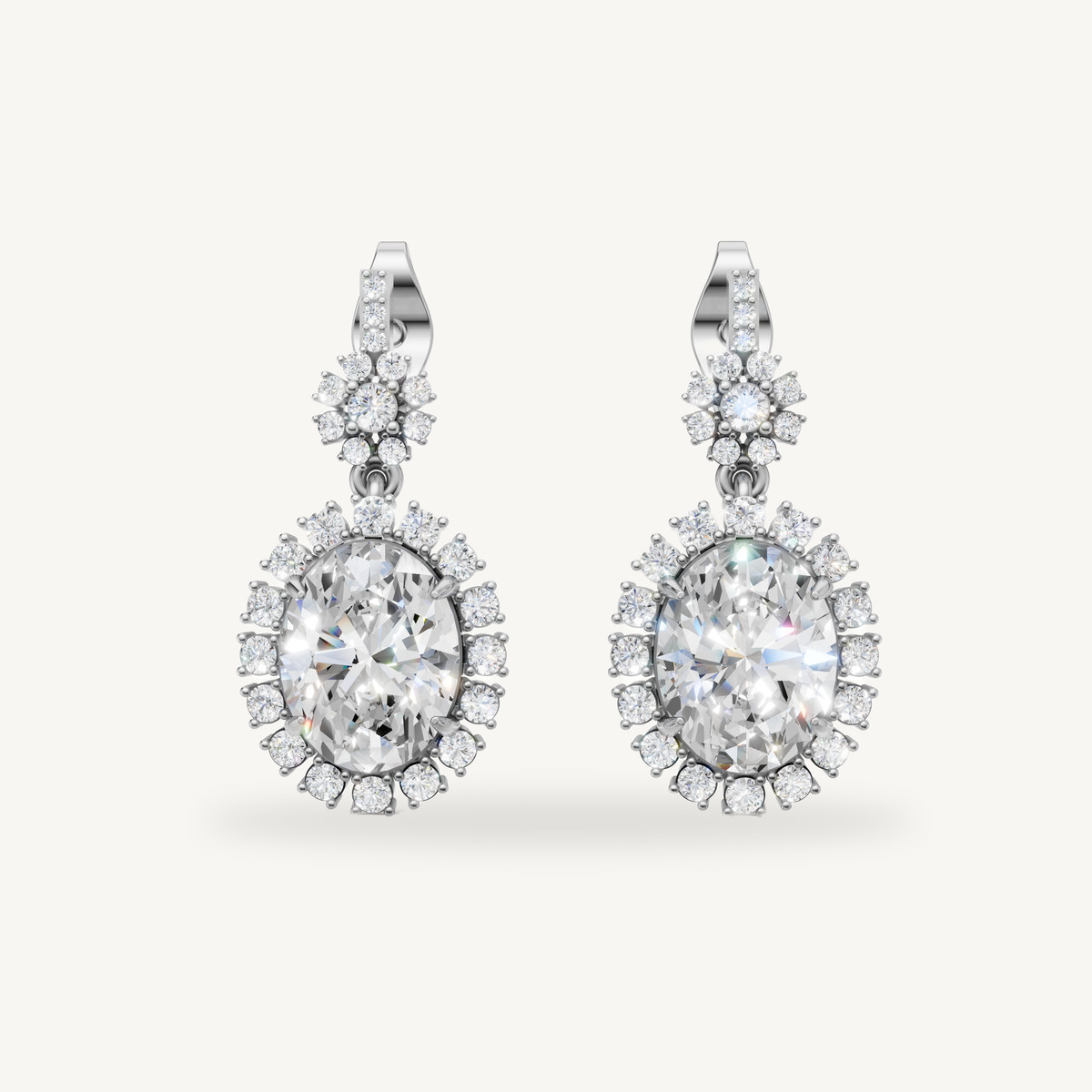 Raul Diamonds white gold oval diamond halo drop earrings with luxurious brilliance
