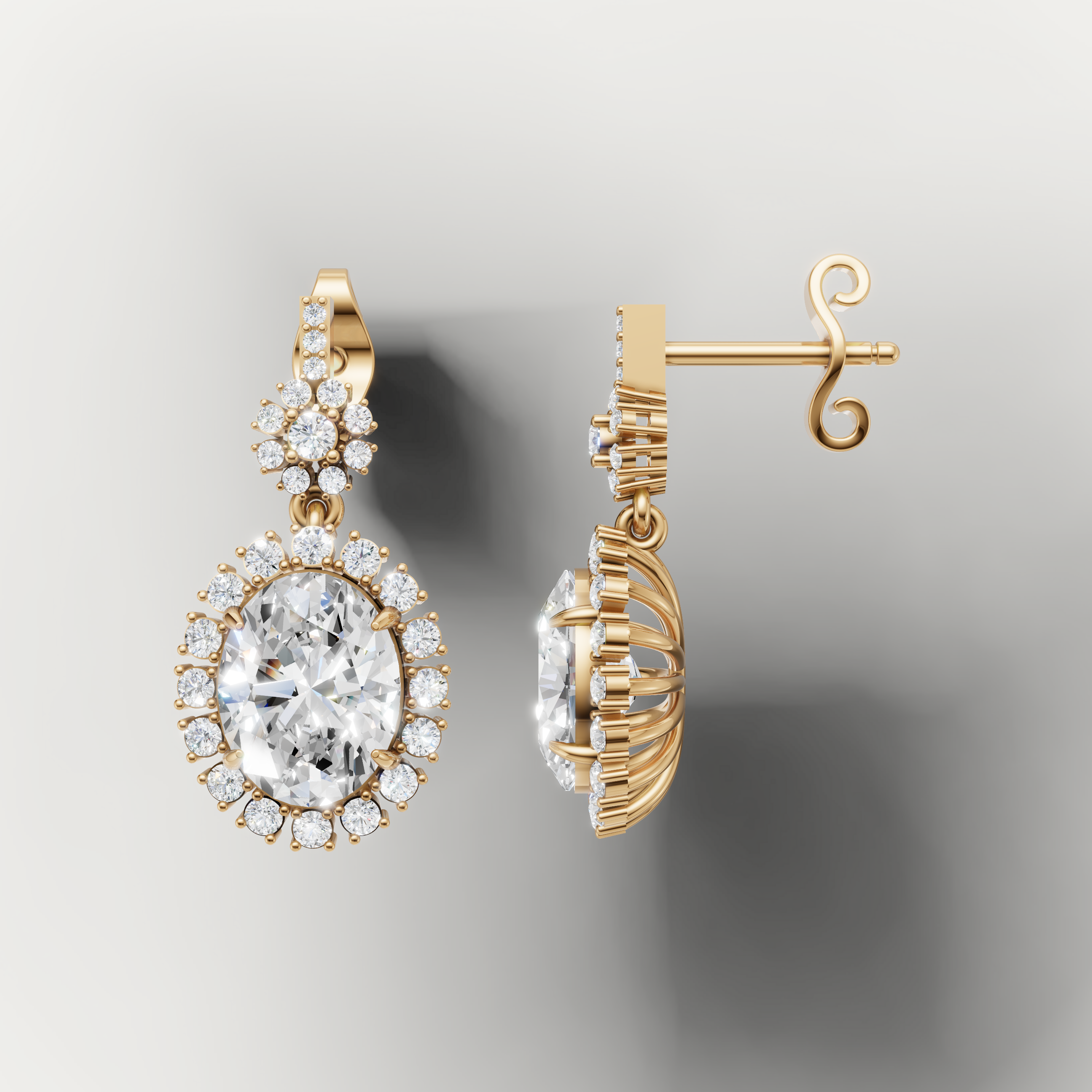 Yellow gold oval cut diamond dangle earrings by Raul Diamonds with halo brilliance