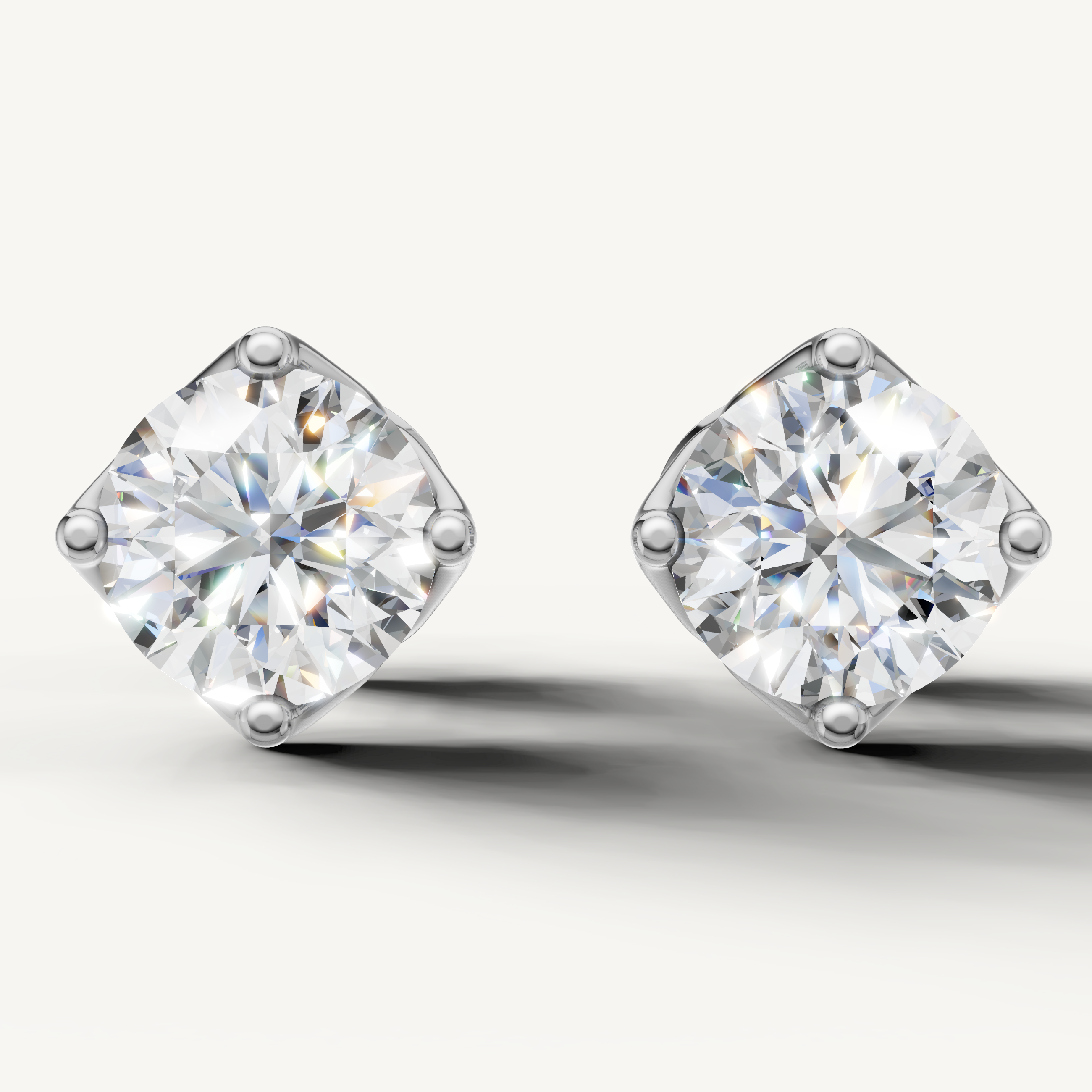 Round lab grown diamond stud earrings in 14K white gold by Raul Diamonds