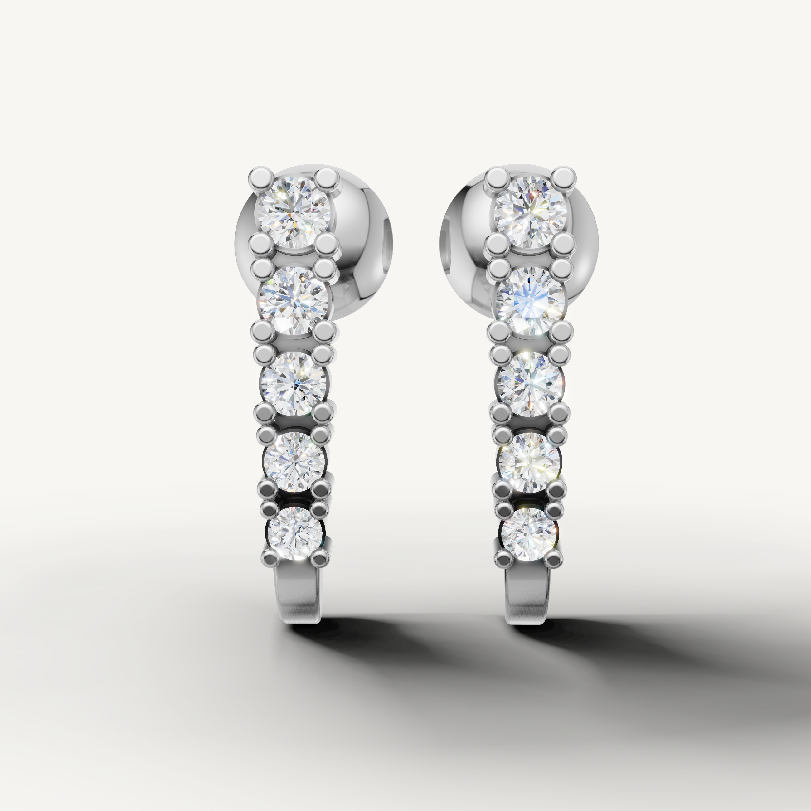 Raul Diamonds white gold diamond hoop earrings with brilliant round cut diamonds