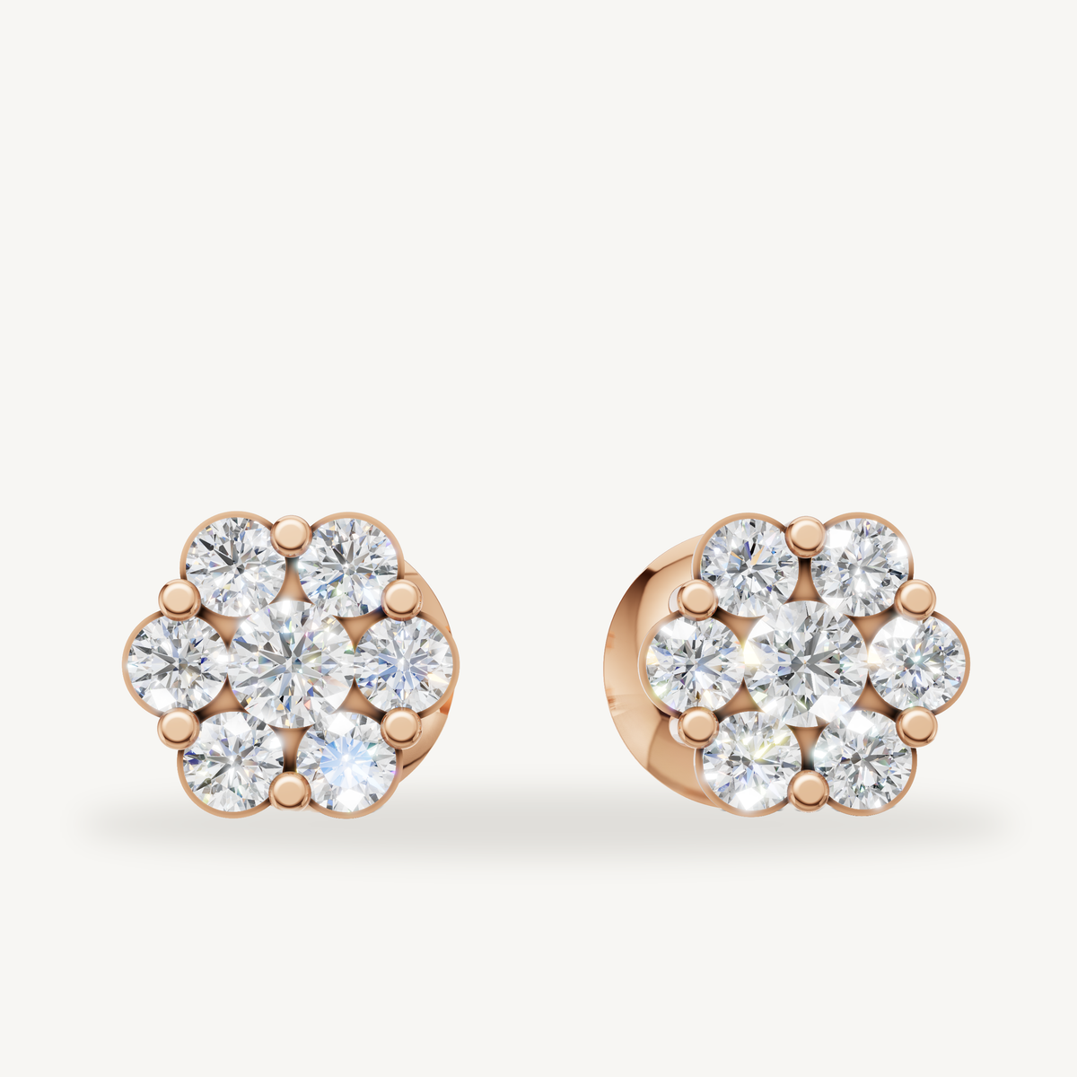 Floral cluster diamond stud earrings in 14K rose gold by Raul Diamonds