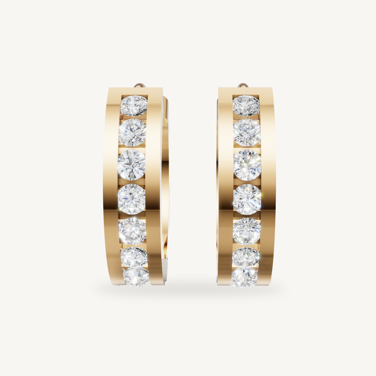 Raul Diamonds yellow gold diamond hoop earrings with round brilliant diamonds and sleek modern design