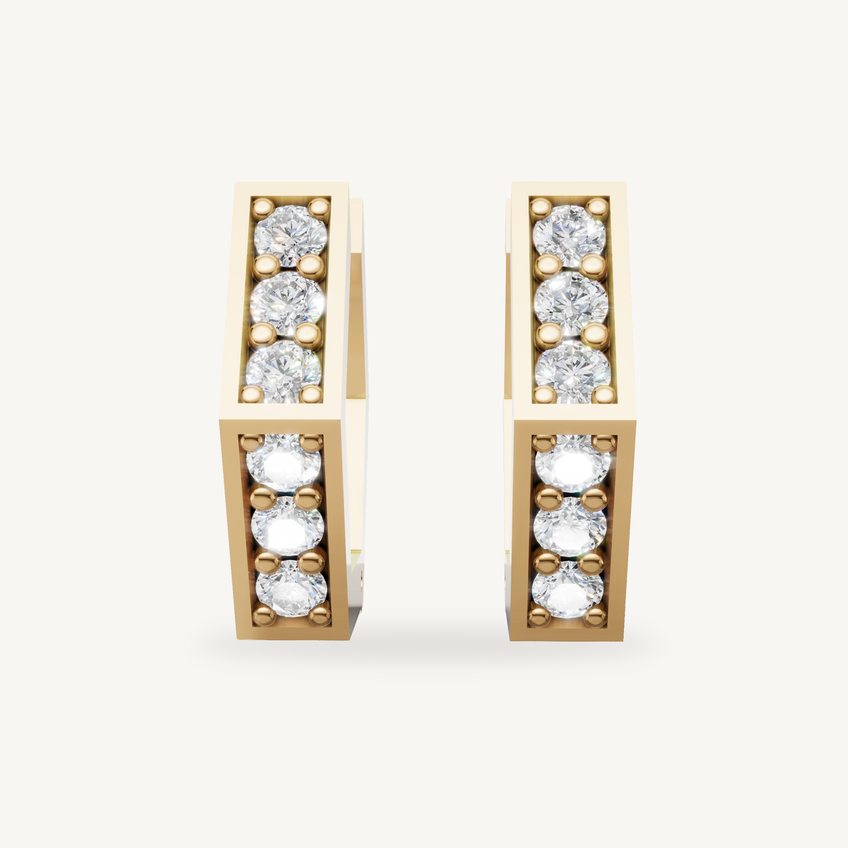 Raul Diamonds yellow gold diamond hoop earrings with princess inspired geometric design and round brilliant diamonds