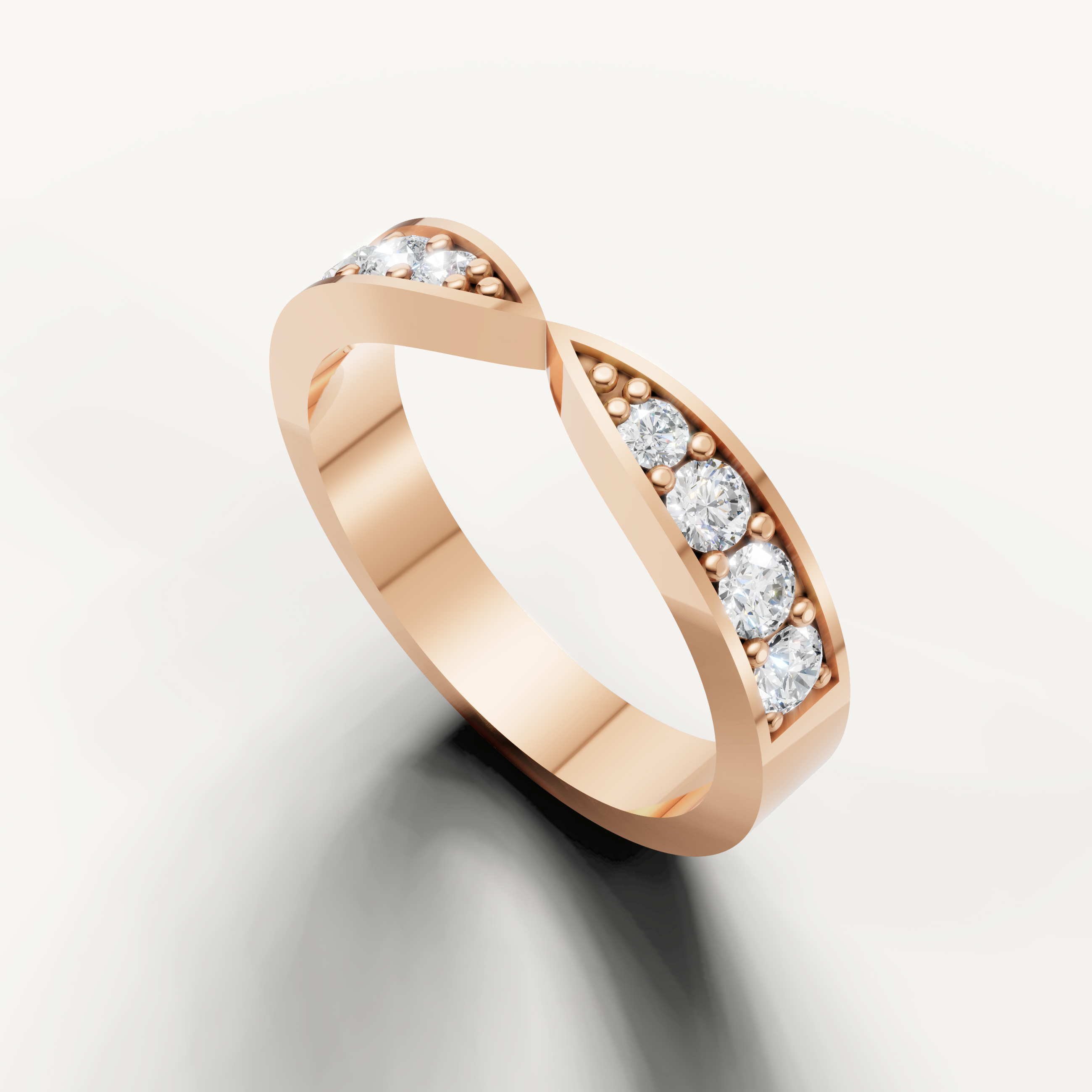 Rose gold modern wedding band featuring sparkling round diamonds and sleek infinity shape