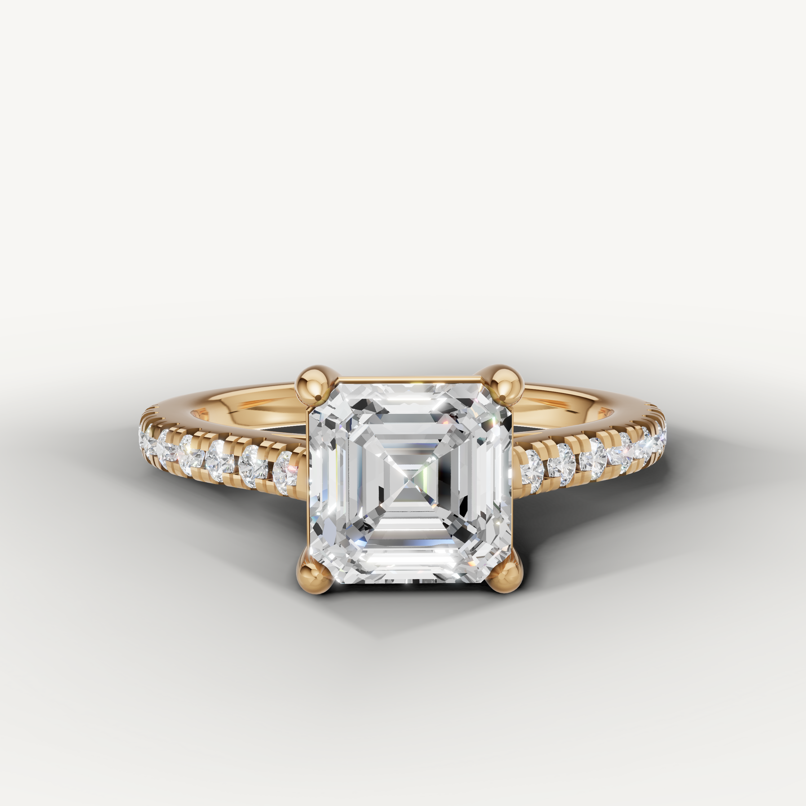 Raul Diamonds yellow gold emerald cut diamond engagement ring with pavé band
