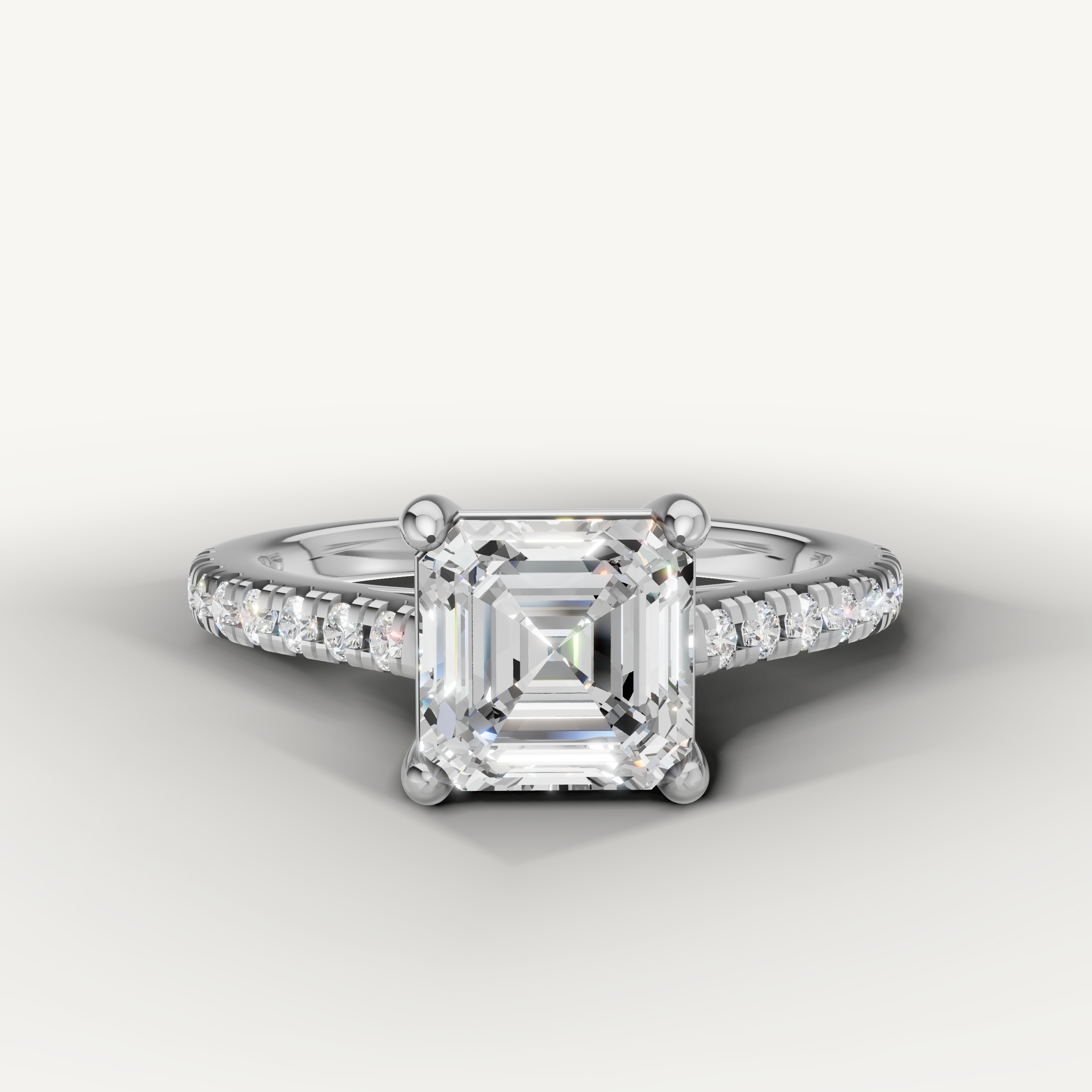 Raul Diamonds white gold emerald cut diamond engagement ring with pavé diamonds
