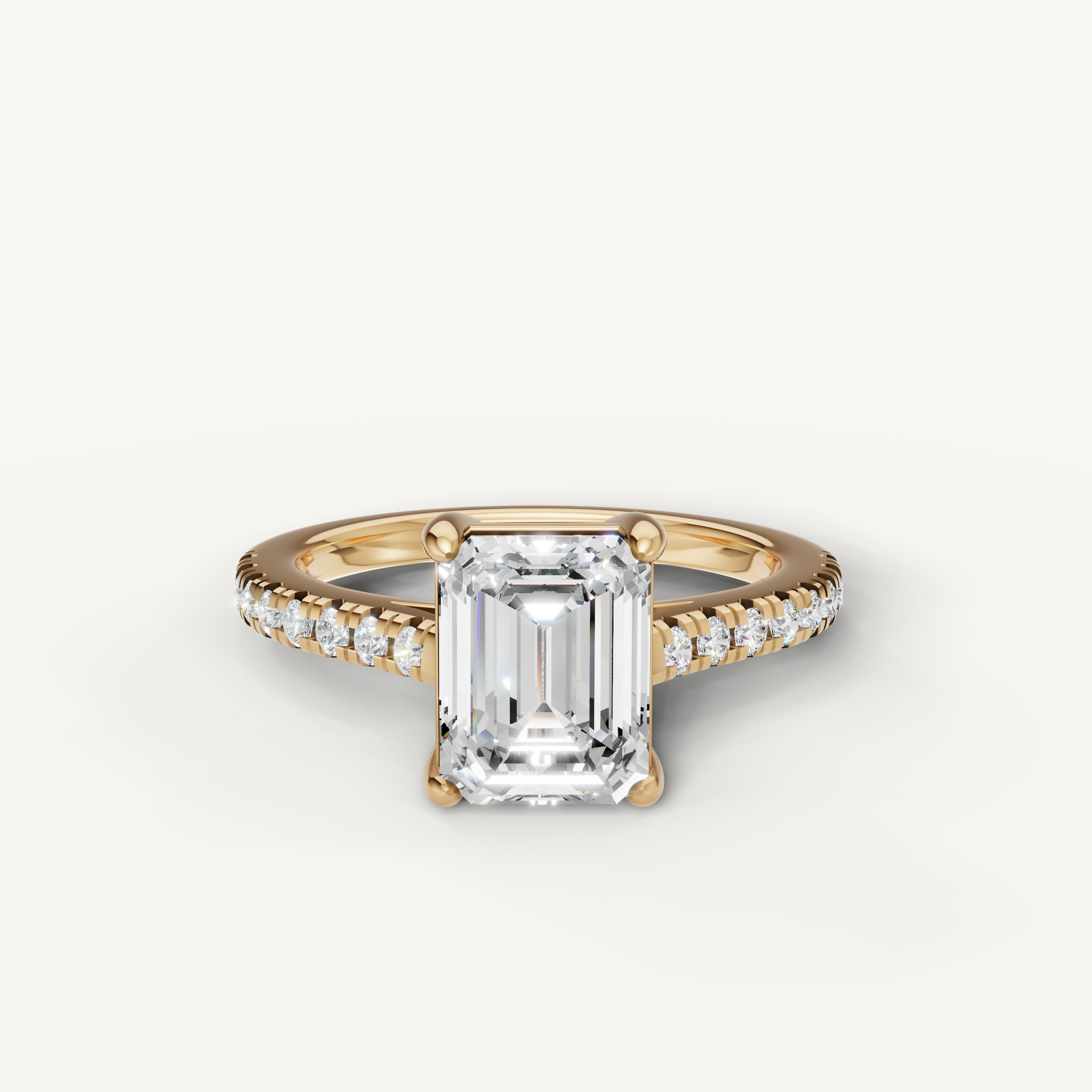 Emerald cut lab grown diamond engagement ring in 14K yellow gold with pavé diamond band
