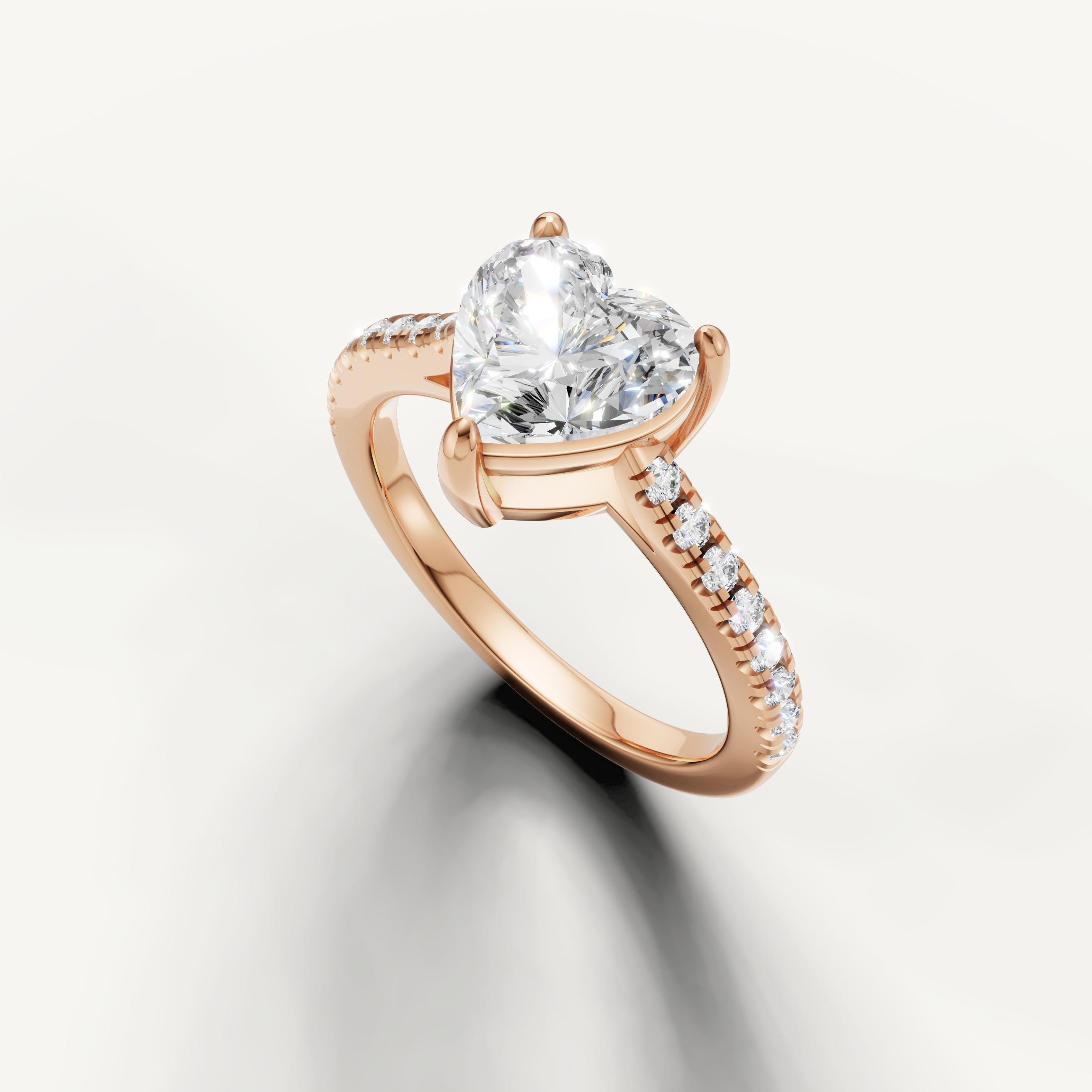 Romantic heart cut lab grown diamond solitaire ring in rose gold with pavé diamonds