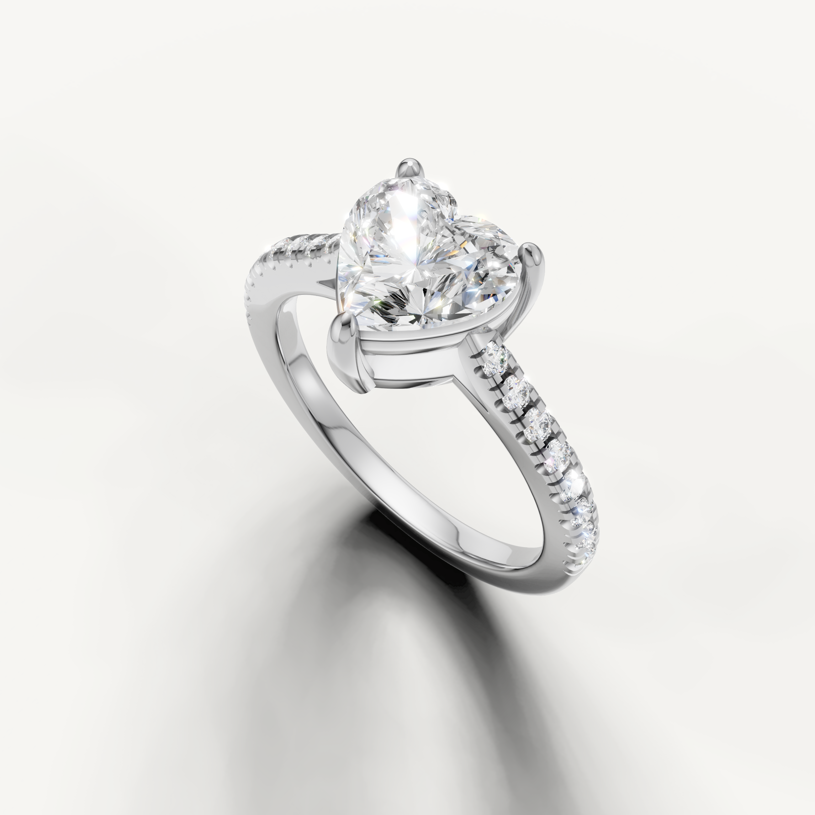 Timeless heart cut lab grown diamond solitaire ring in white gold with pavé diamonds