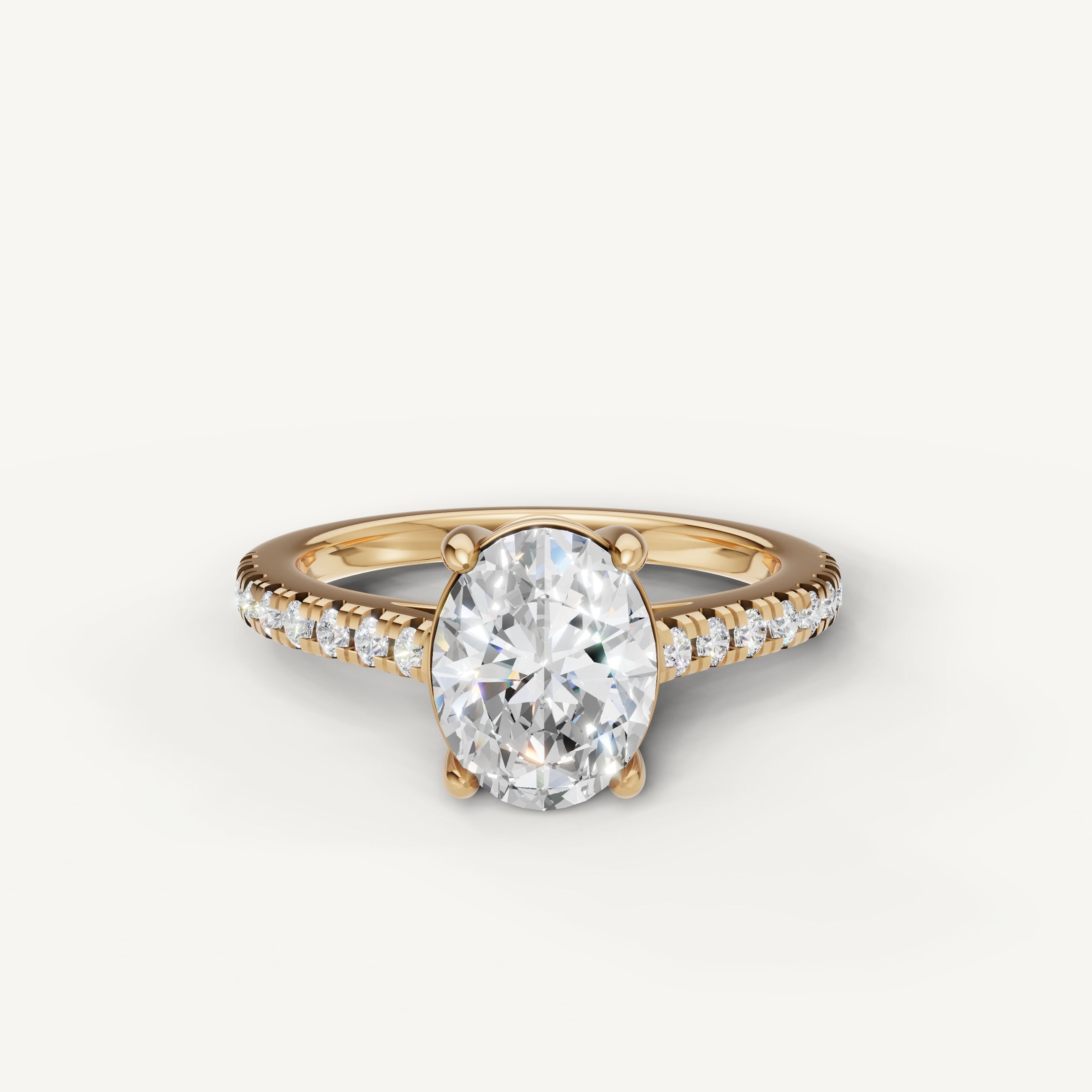 Oval cut lab grown diamond engagement ring in 14K yellow gold with pavé diamond band