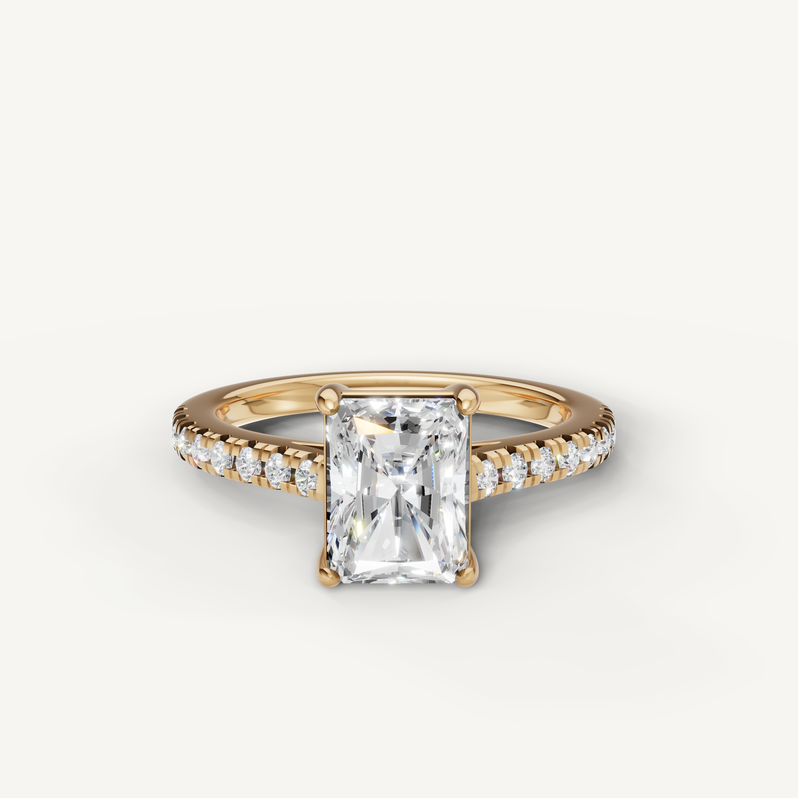 Radiant cut lab grown diamond engagement ring in 14K yellow gold with pavé band