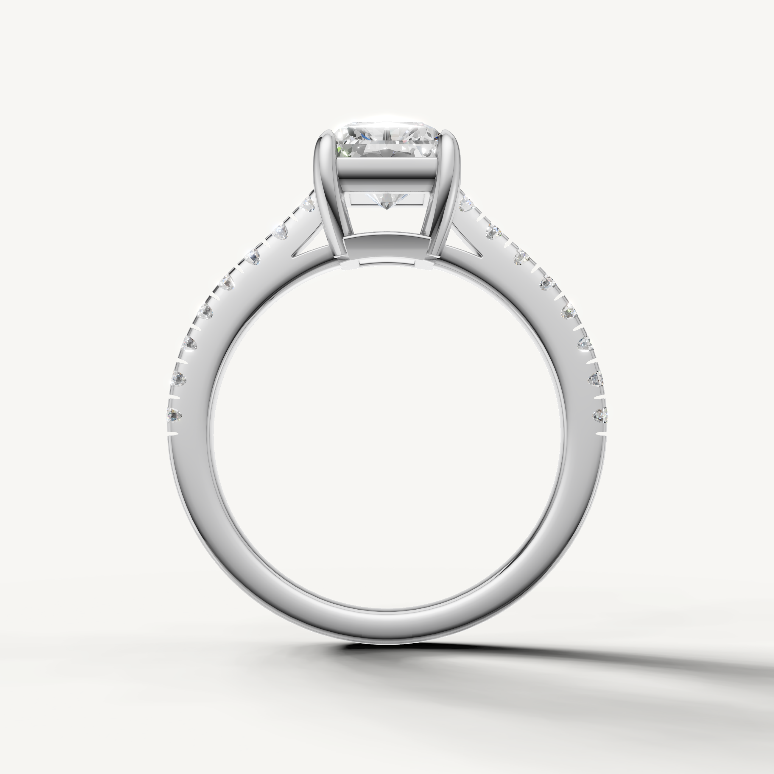 Classic radiant cut engagement ring in white gold with pavé diamonds