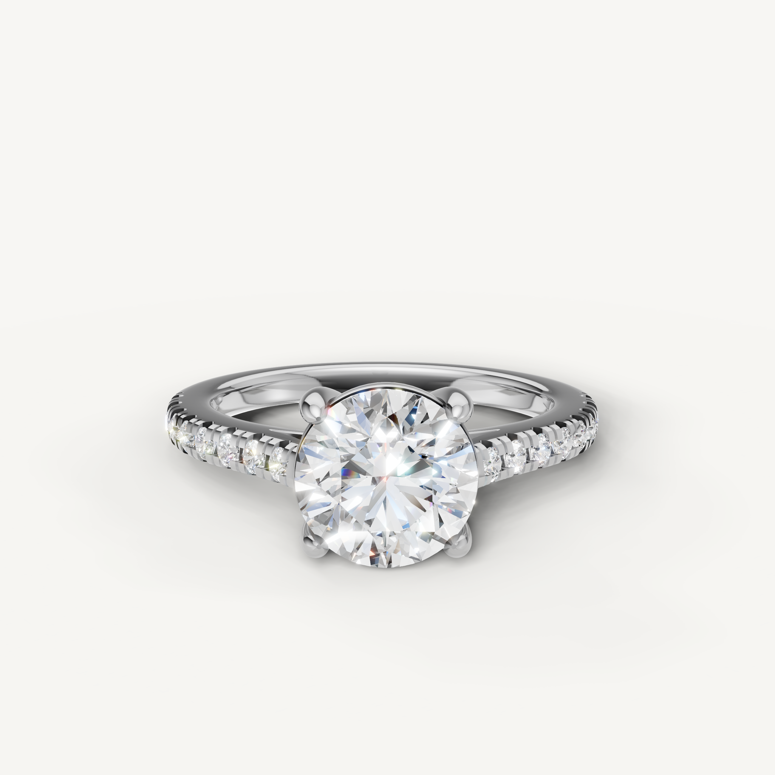 Round brilliant cut lab grown diamond engagement ring in 14K white gold with pavé band