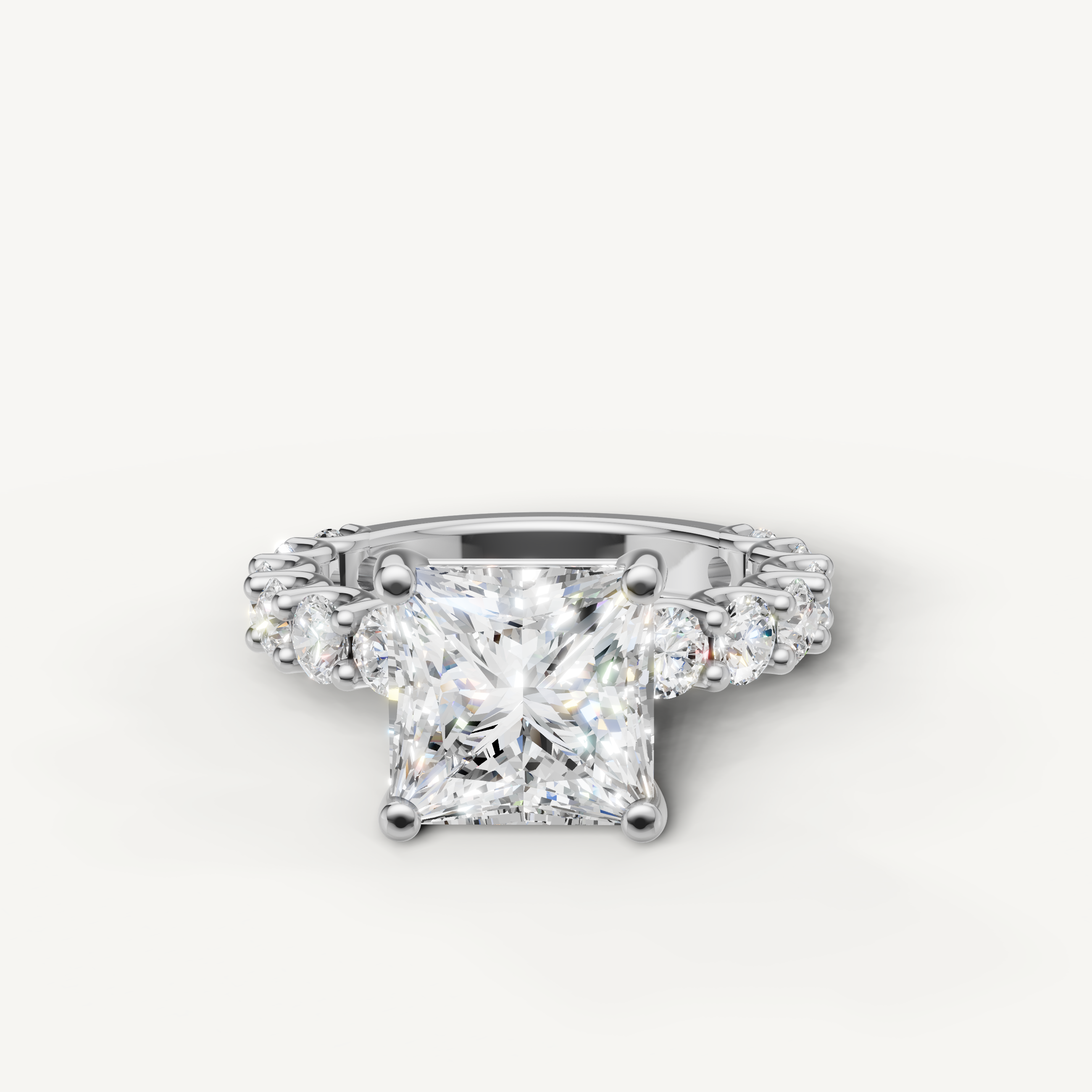 White gold princess cut lab grown diamond engagement ring with shared prong round diamond eternity band by Raul Diamonds