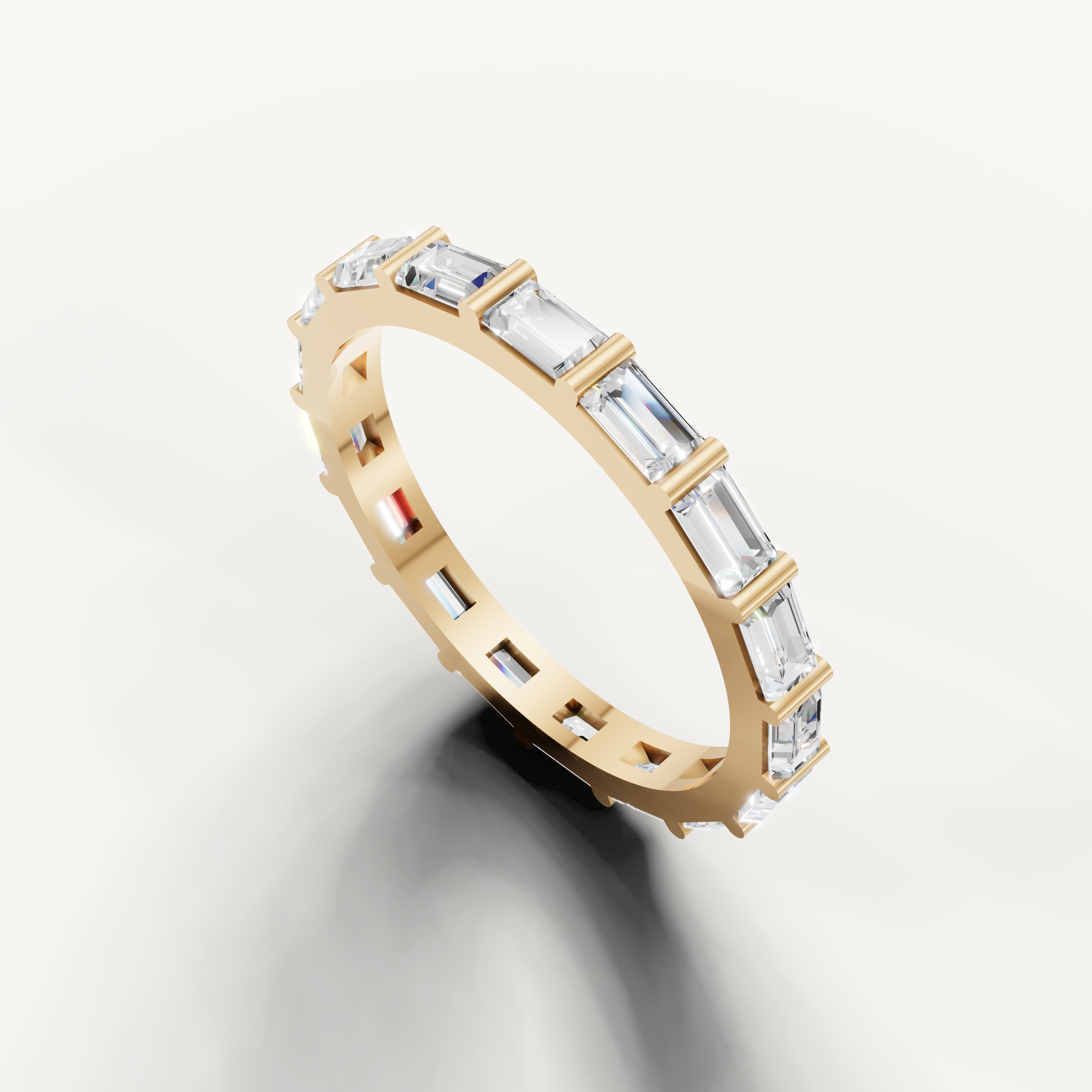Yellow gold baguette diamond anniversary band with modern channel setting Raul Diamonds