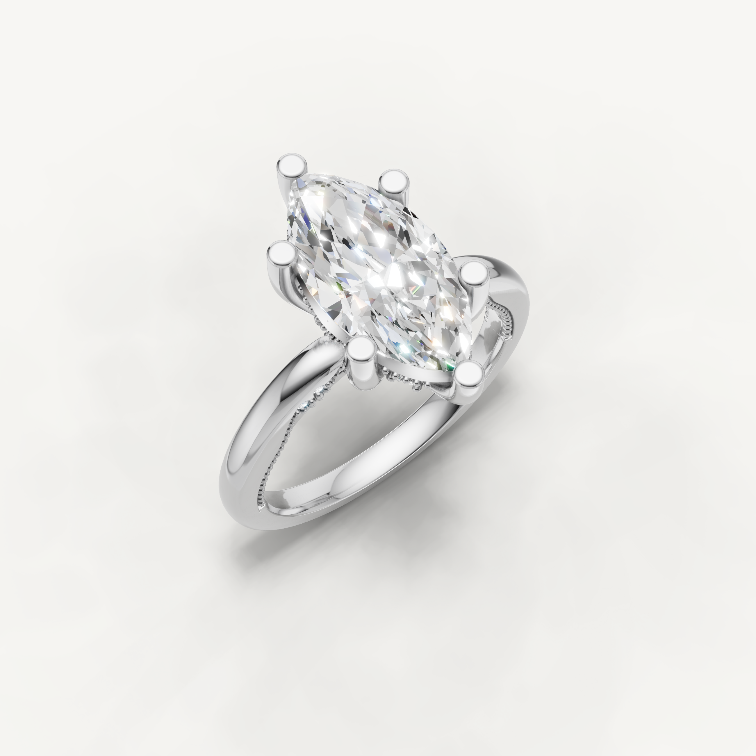 Elegant white gold marquise diamond engagement ring with timeless solitaire design by Raul Diamonds